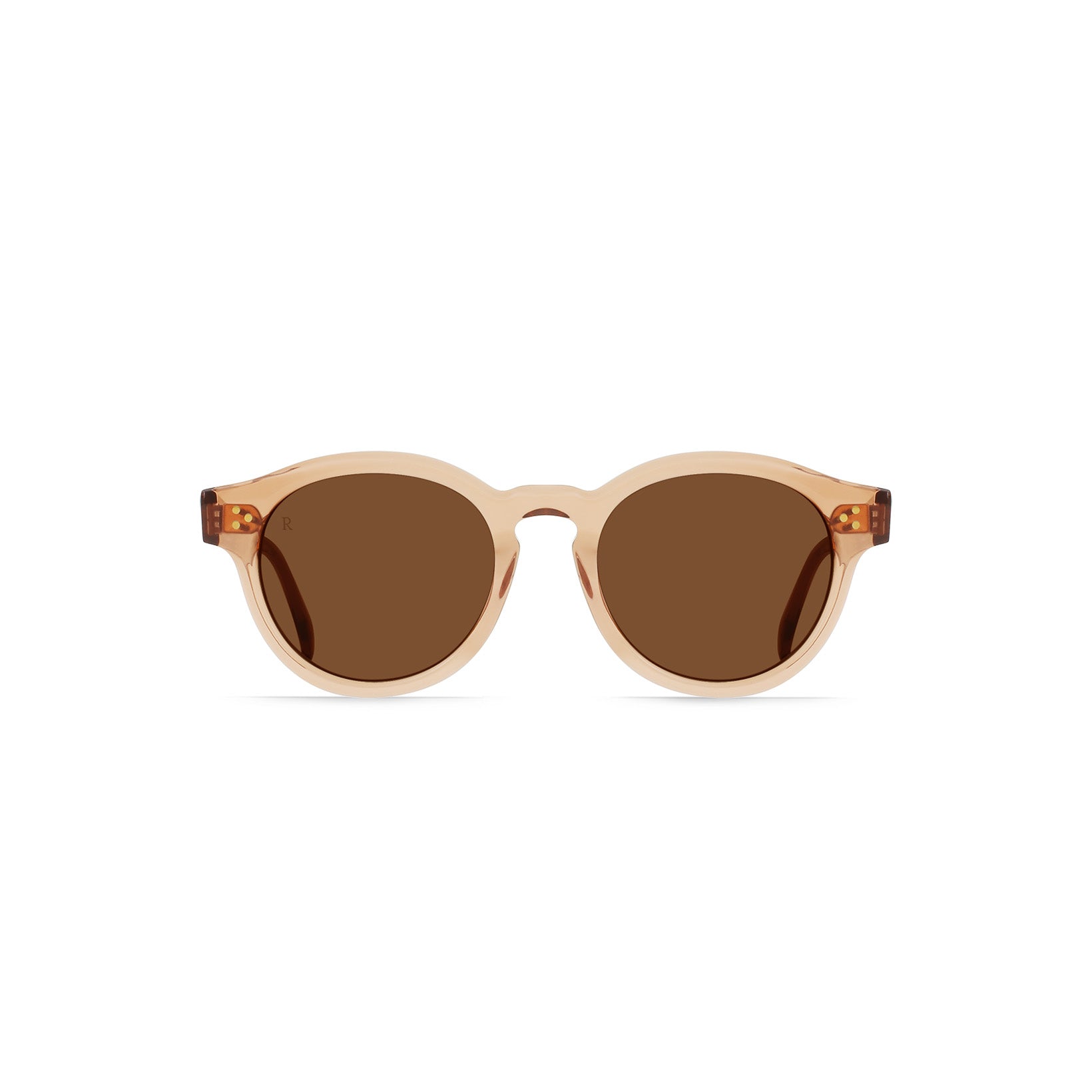 The Zelti sunglasses by Raen Optics feature diamond-shaped translucent beige (Sedona) frames and brown tinted lenses, displayed on a white background.