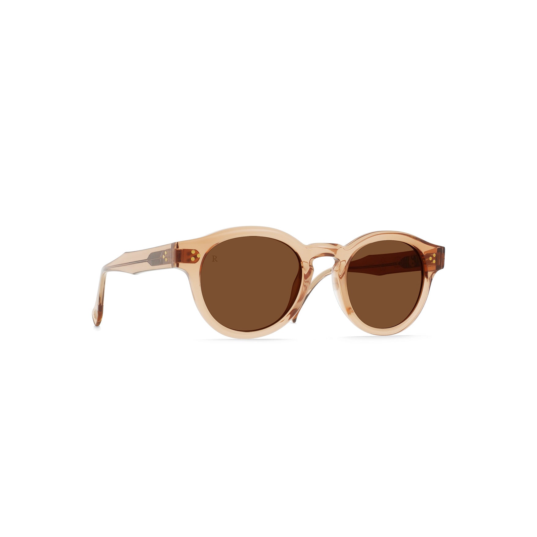 The Raen Optics Zelti, Diamond/Sedona are beige round sunglasses with brown tinted lenses and translucent plastic frames, shown on a white background.