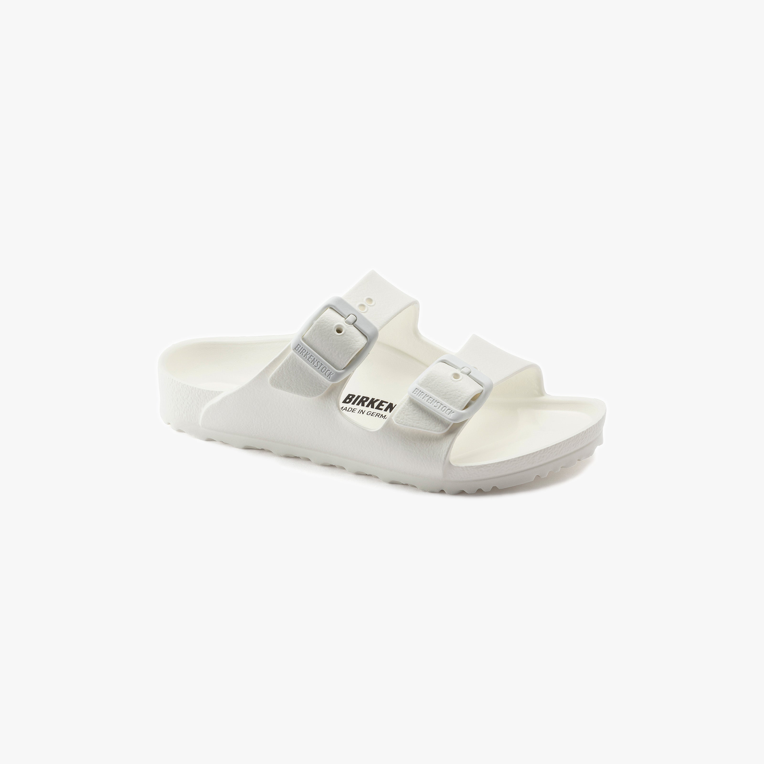 The Birkenstock Arizona EVA Narrow in Eggshell features two adjustable buckles and a signature comfort footbed. This water-friendly sandal sits on a plain white background, viewed from a slight angle.
