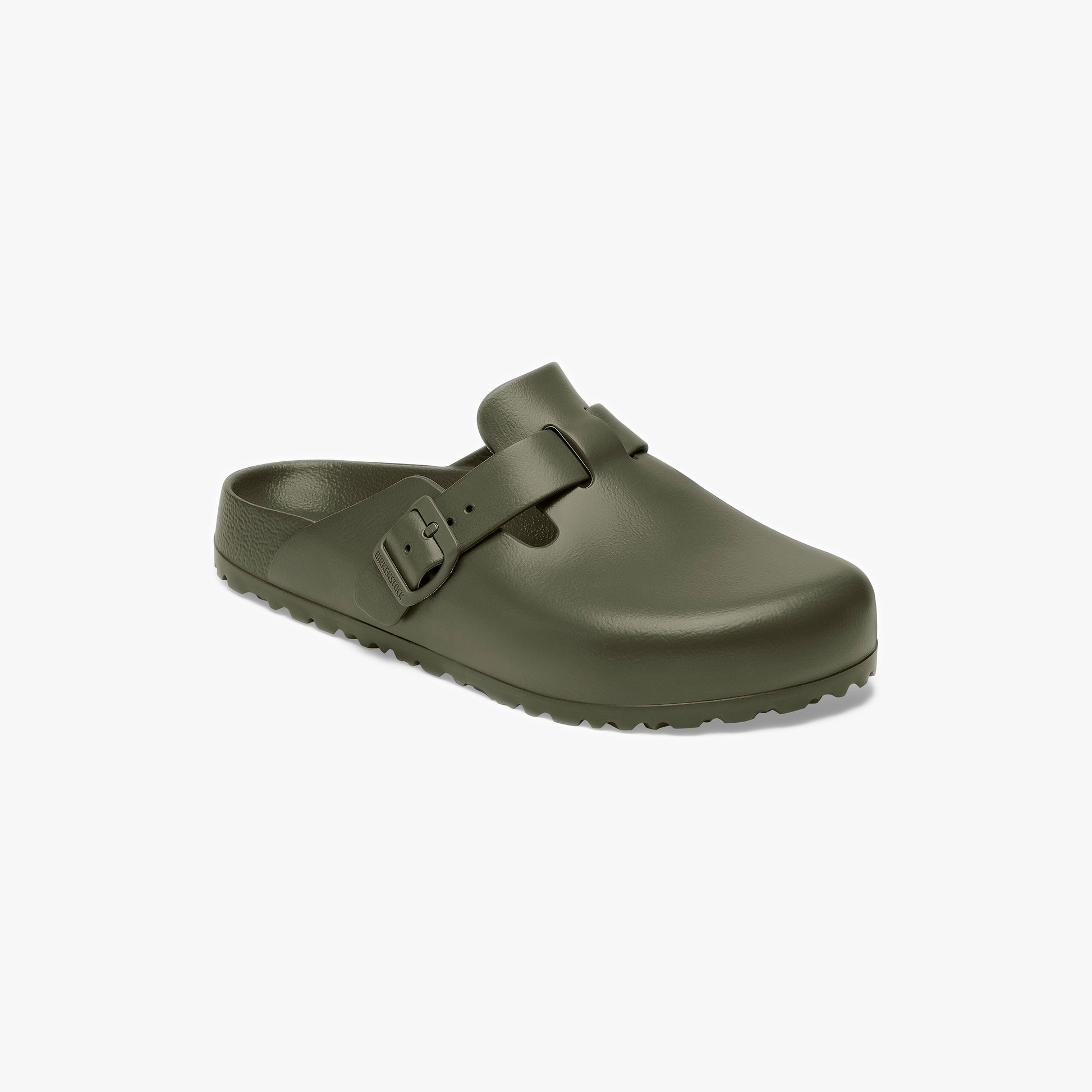 The Birkenstock Boston EVA Narrow in khaki is a slip-on clog with a closed toe, contoured footbed, adjustable buckle strap, and textured sole, shown on a white background.