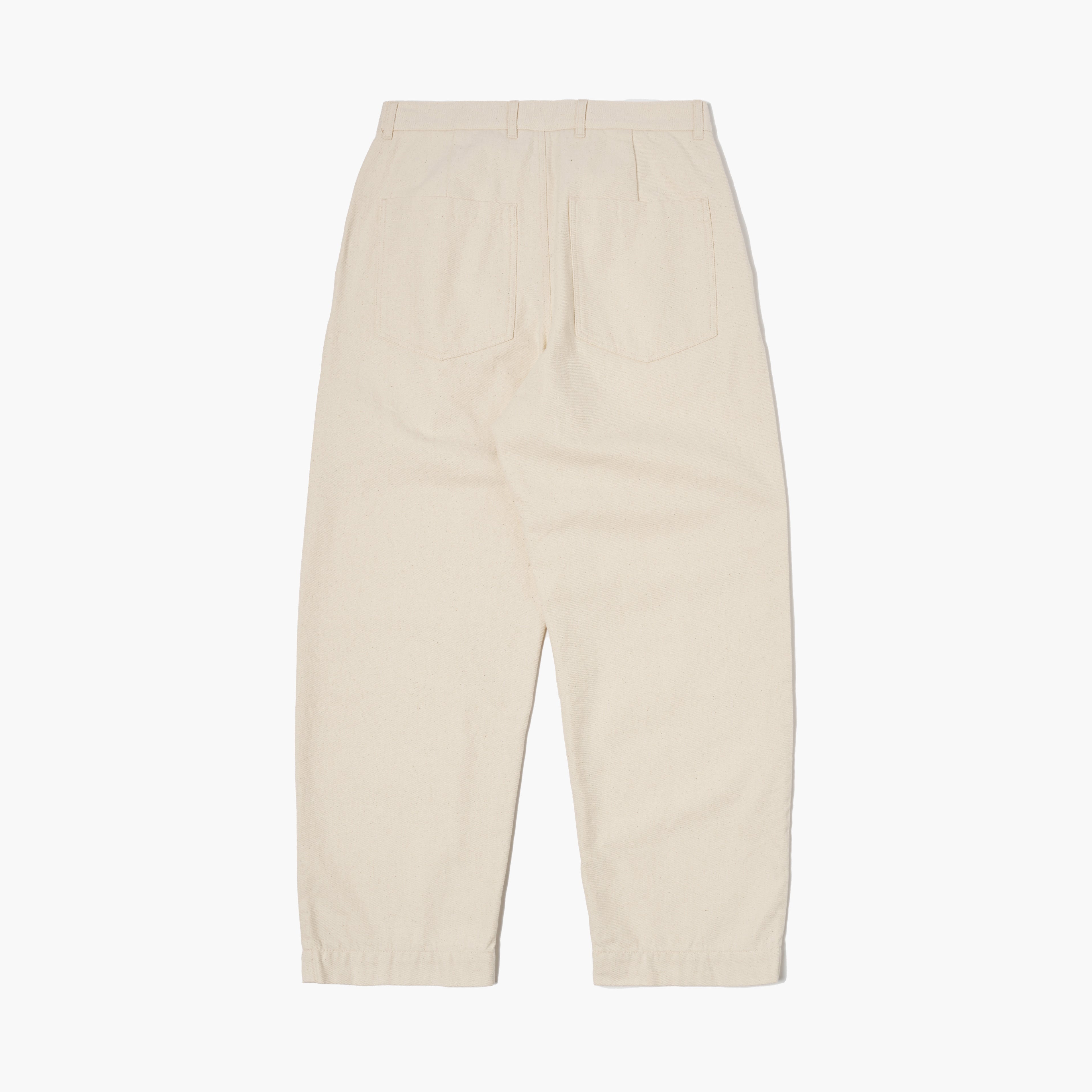 Universal Works Recycled Cotton Duke Pant in Ecru, high-waisted with straight legs, shown flat on a white background displaying the back with two rear pockets and belt loops.