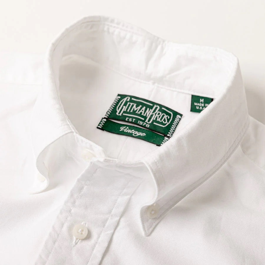A Classic White Oxford shirt by Gitman Vintage, featuring a visible branded label on the inside collar.