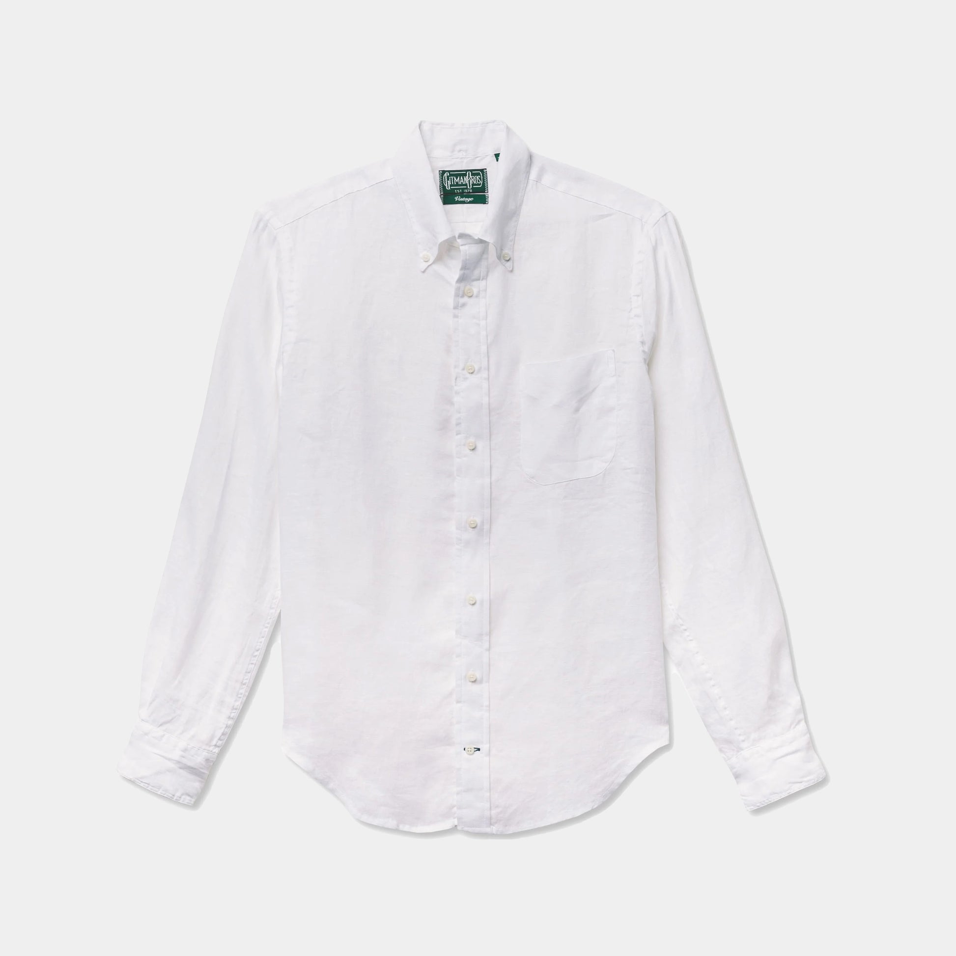 The Gitman Vintage White Linen Shirt, featuring long sleeves, a front pocket, and button-up design, is displayed laid flat on a plain background.