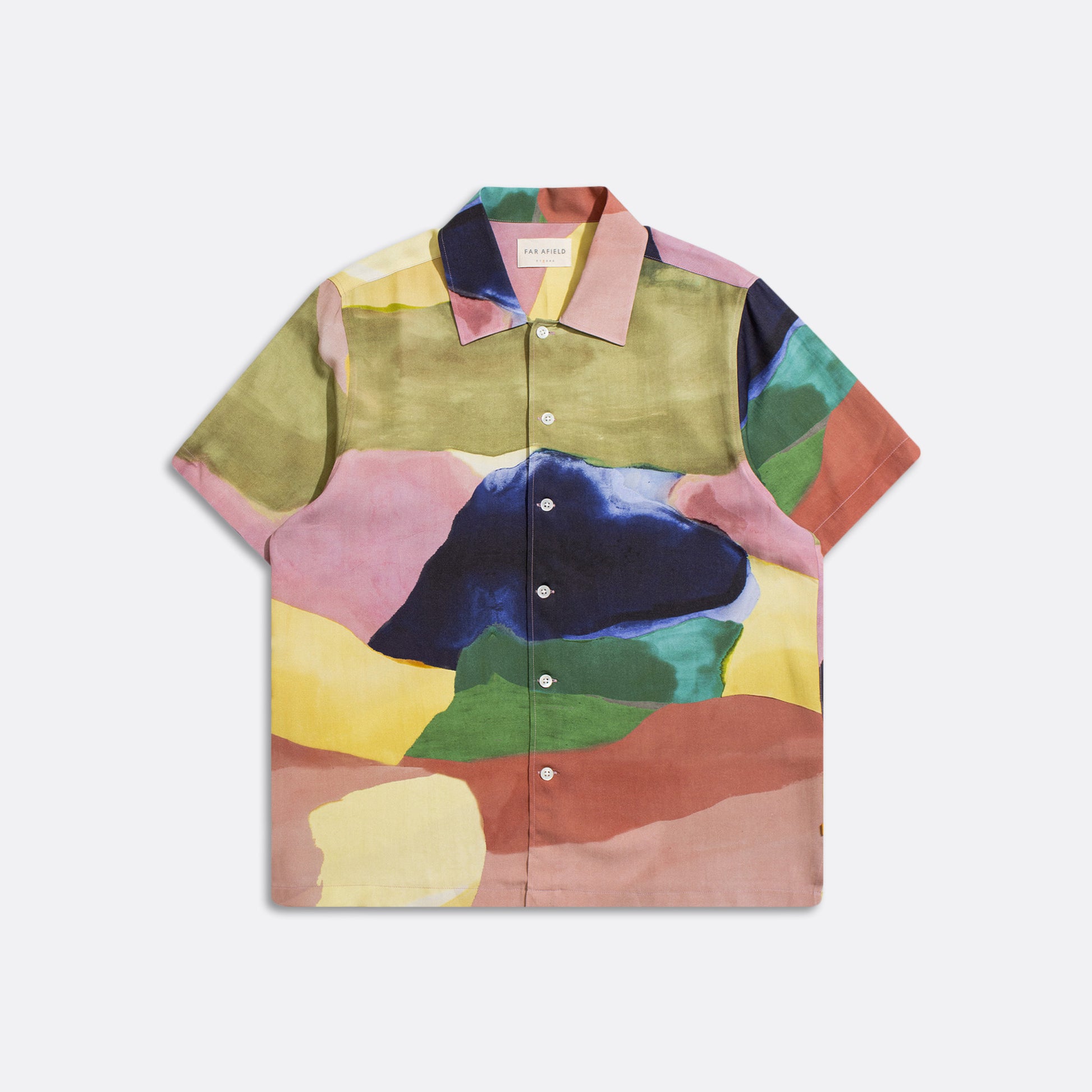 The Far Afield Busey SS Shirt features a colorful, abstract landscape print in green, pink, blue, yellow, and red on soft Tencel fabric.