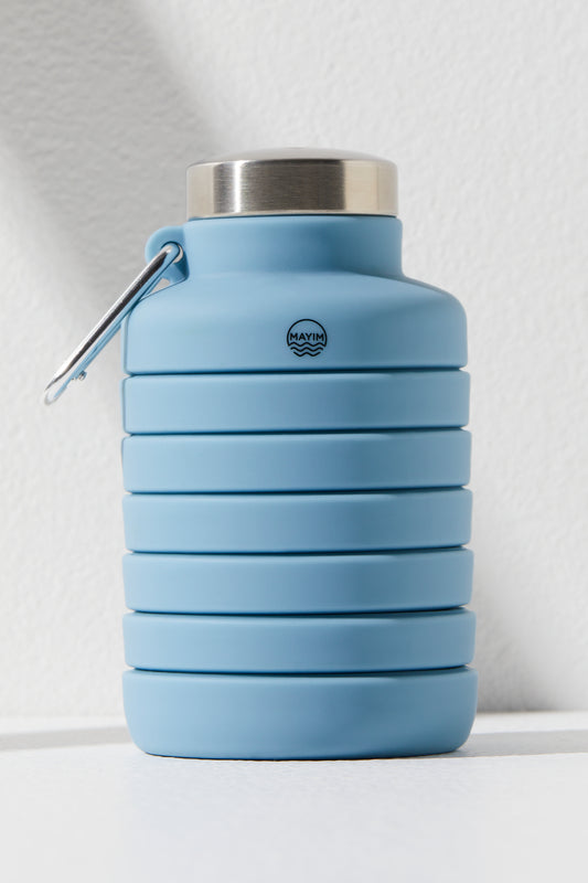 24OZ Carabiner Bottle, Steel Blue by Free People Movement, with a sustainable stainless steel lid and set against a white background.