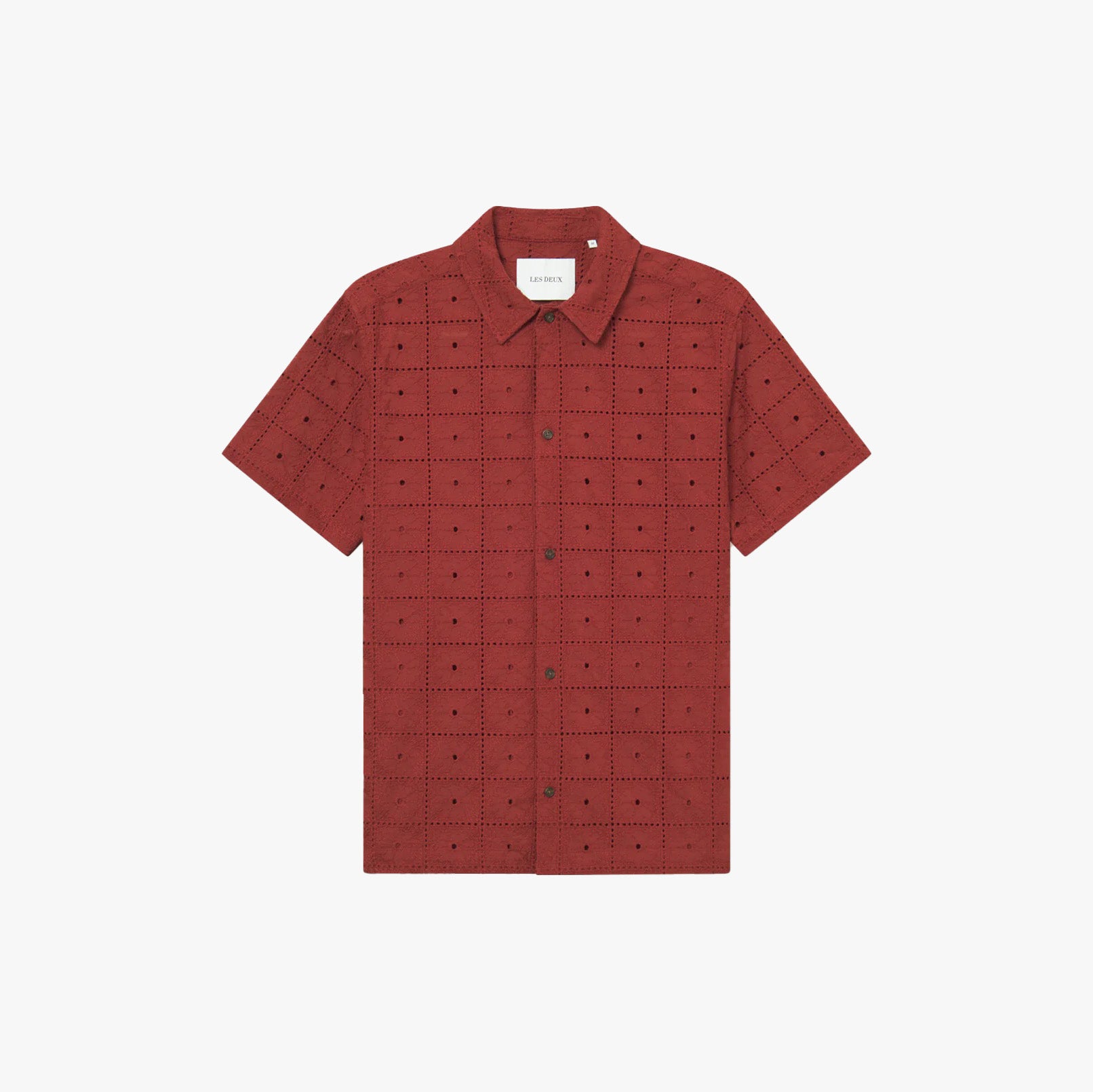 The Les Deux Hector Anglaise SS Shirt is a short-sleeve button-up in dark red with a grid pattern and small black dots, featuring a classic collar, shown on a plain white background.