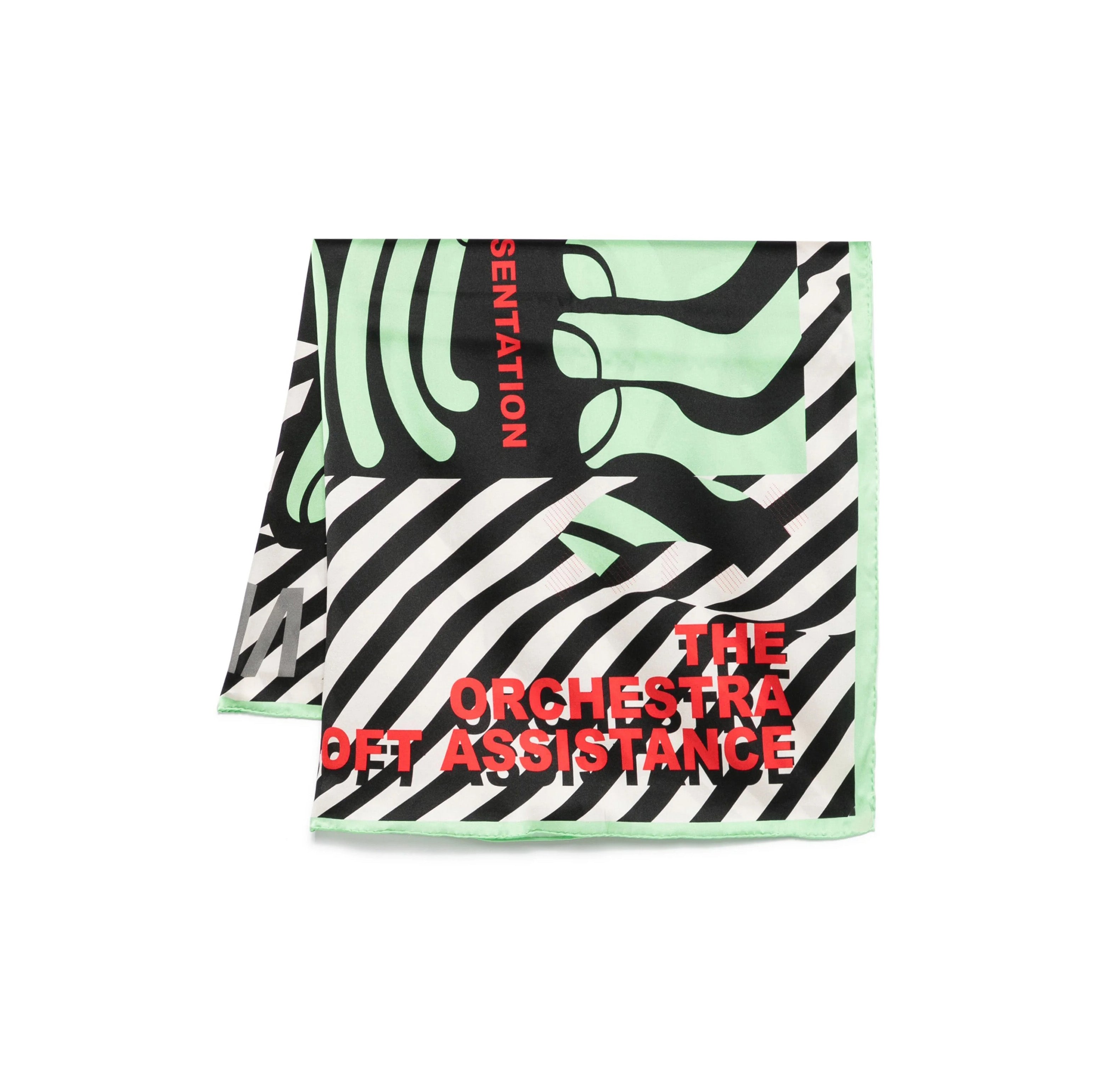 The Orchestra Silk Scarf by Henrik Vibskov features a square design with black and white diagonal stripes, green abstract shapes, and bold red "THE ORCHESTRA OFT ASSISTANCE" text in a modern wraparound style.