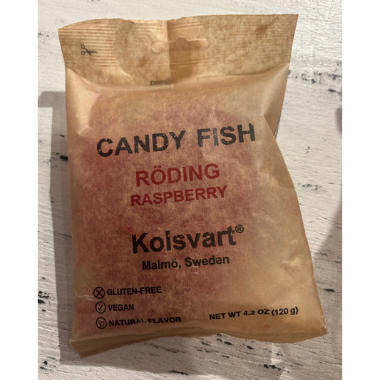A package of Swedish fish Raspberry - Kolsvart candy, labeled gluten-free and vegan, from Malmö, Sweden.