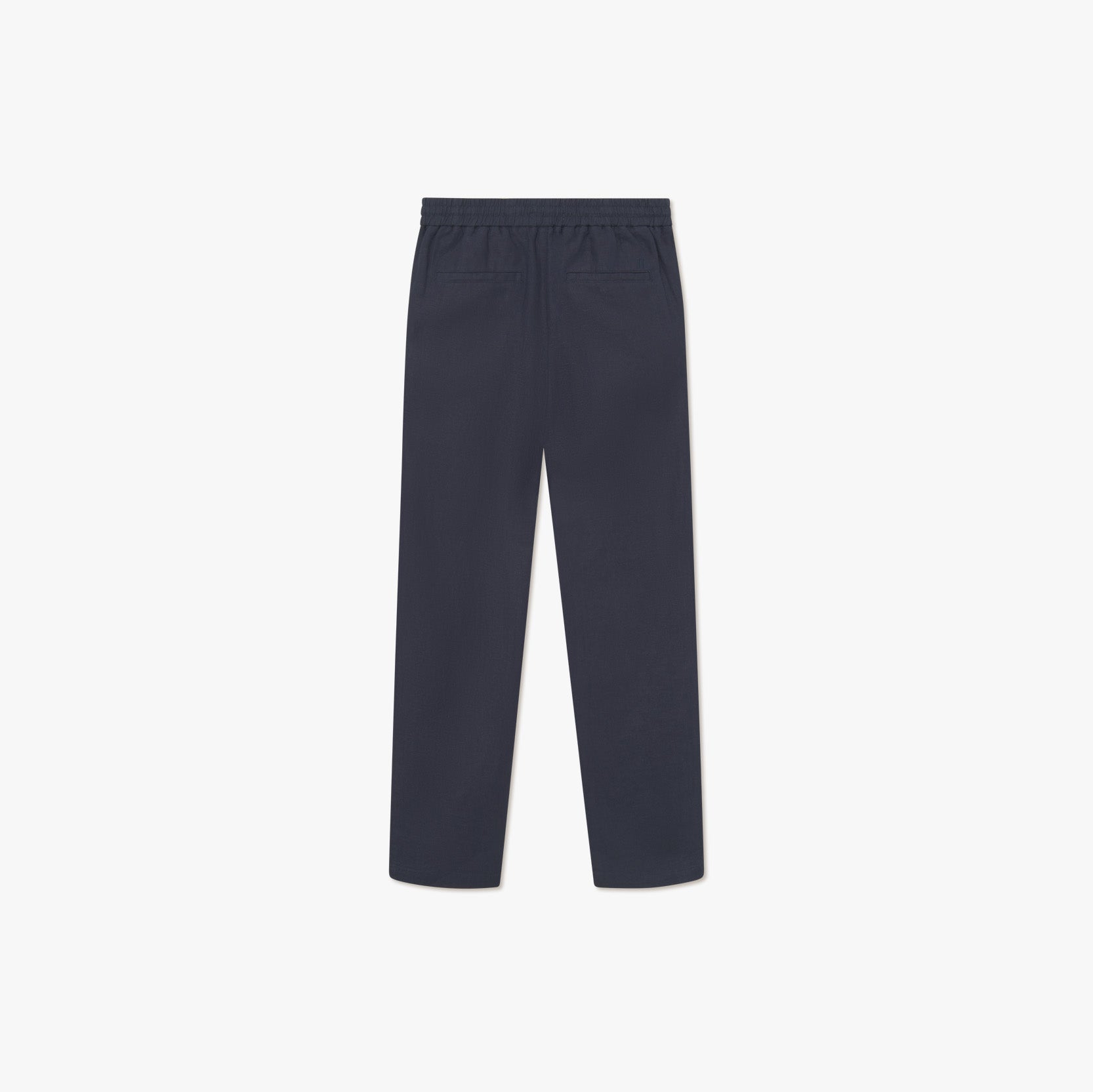 Les Deux Patrick Linen Pants in dark navy feature a relaxed straight-leg cut, elastic waistband, and breathable fabric, displayed from the back on a plain white background.