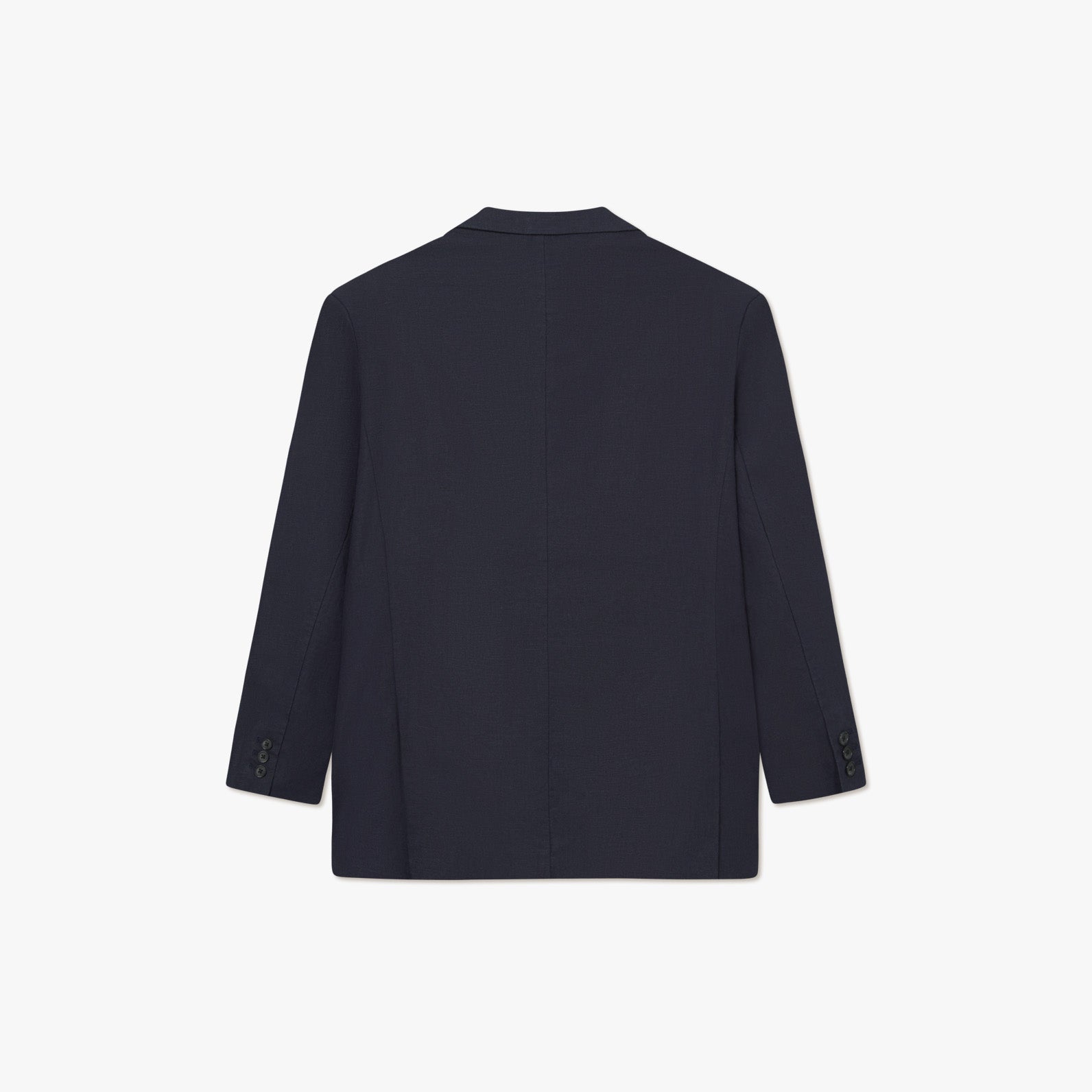 The Les Deux James Linen Blazer is shown from the back against a plain white background, featuring long sleeves, a straight hem, and cuff buttons—an ideal loose fit choice for warm weather suiting.