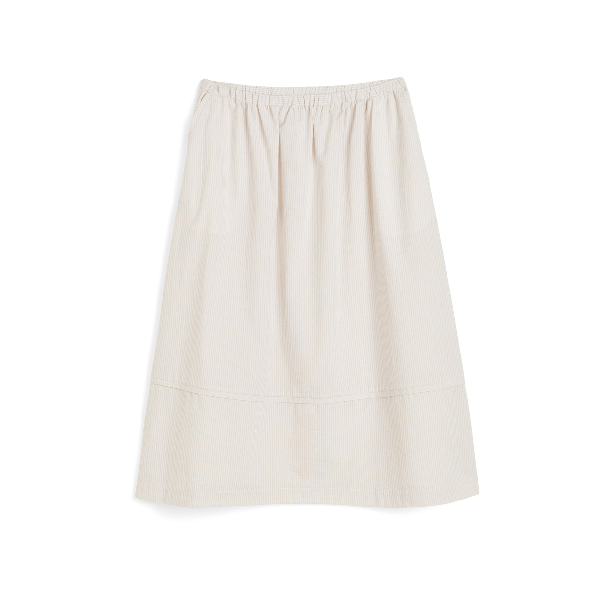 The Luka Seersucker Skirt by Aiayu is a cream-colored, ankle-length skirt featuring an elastic waistband and subtle vertical texture.