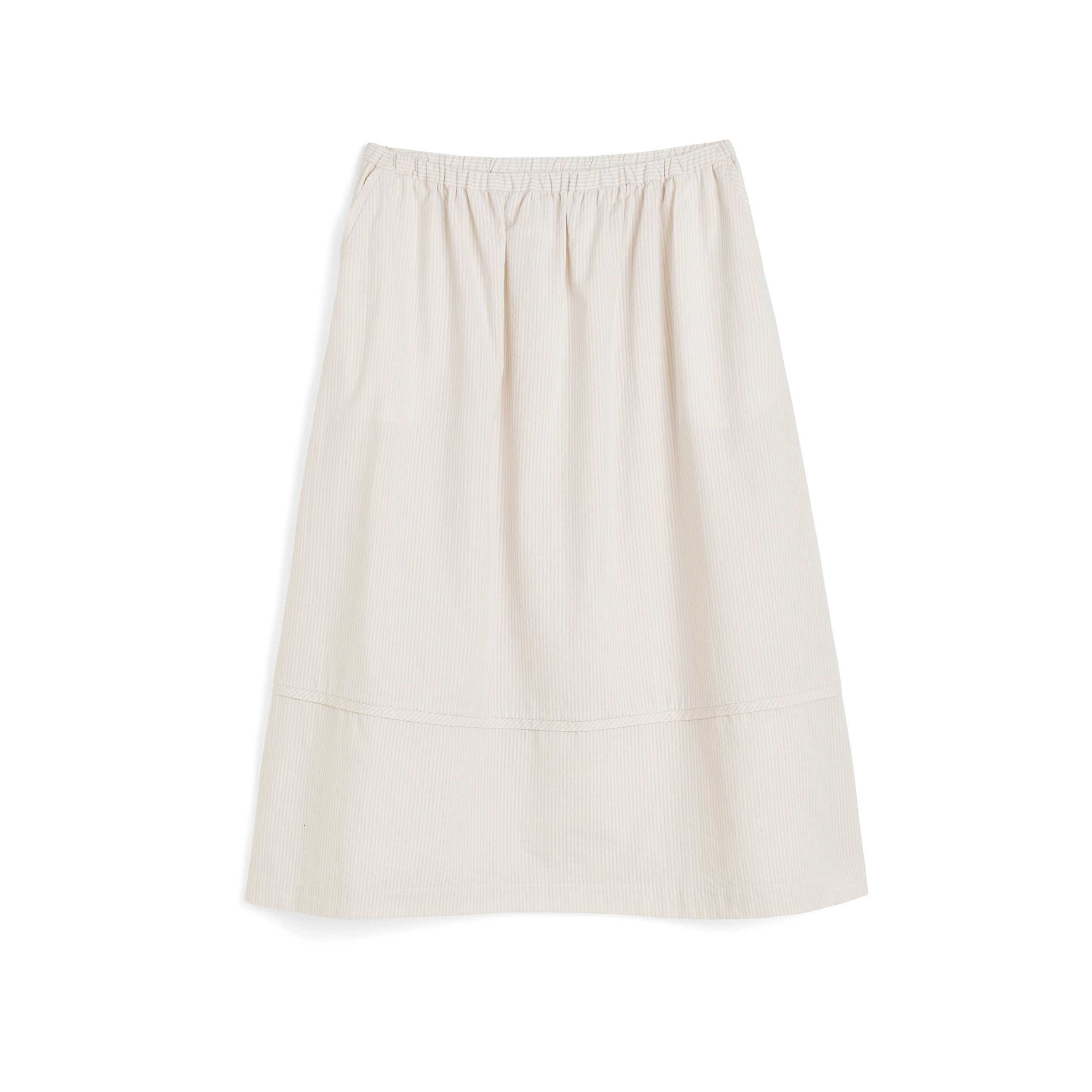 The Luka Seersucker Skirt by Aiayu is a cream-colored, ankle-length skirt featuring an elastic waistband and subtle vertical texture.