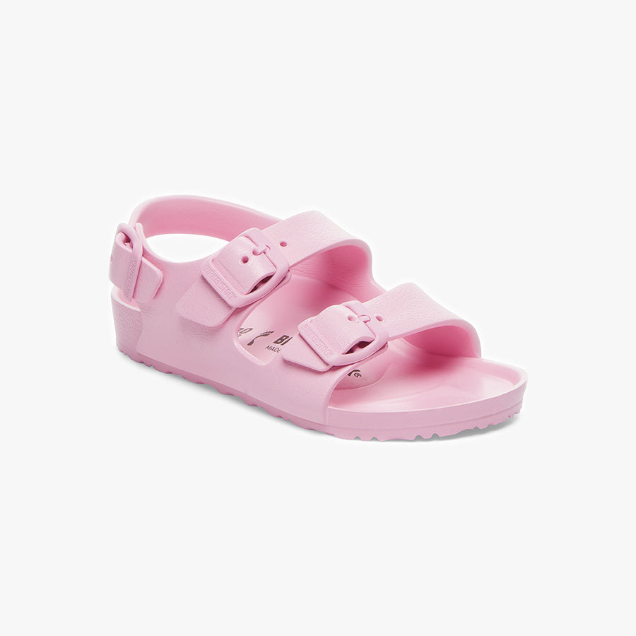 The Birkenstock Milano EVA Kids sandals in Fondant Pink feature two adjustable buckle straps, a back strap, an anatomically shaped footbed, and a textured sole. These waterproof kids’ sandals are shown against a plain white background.