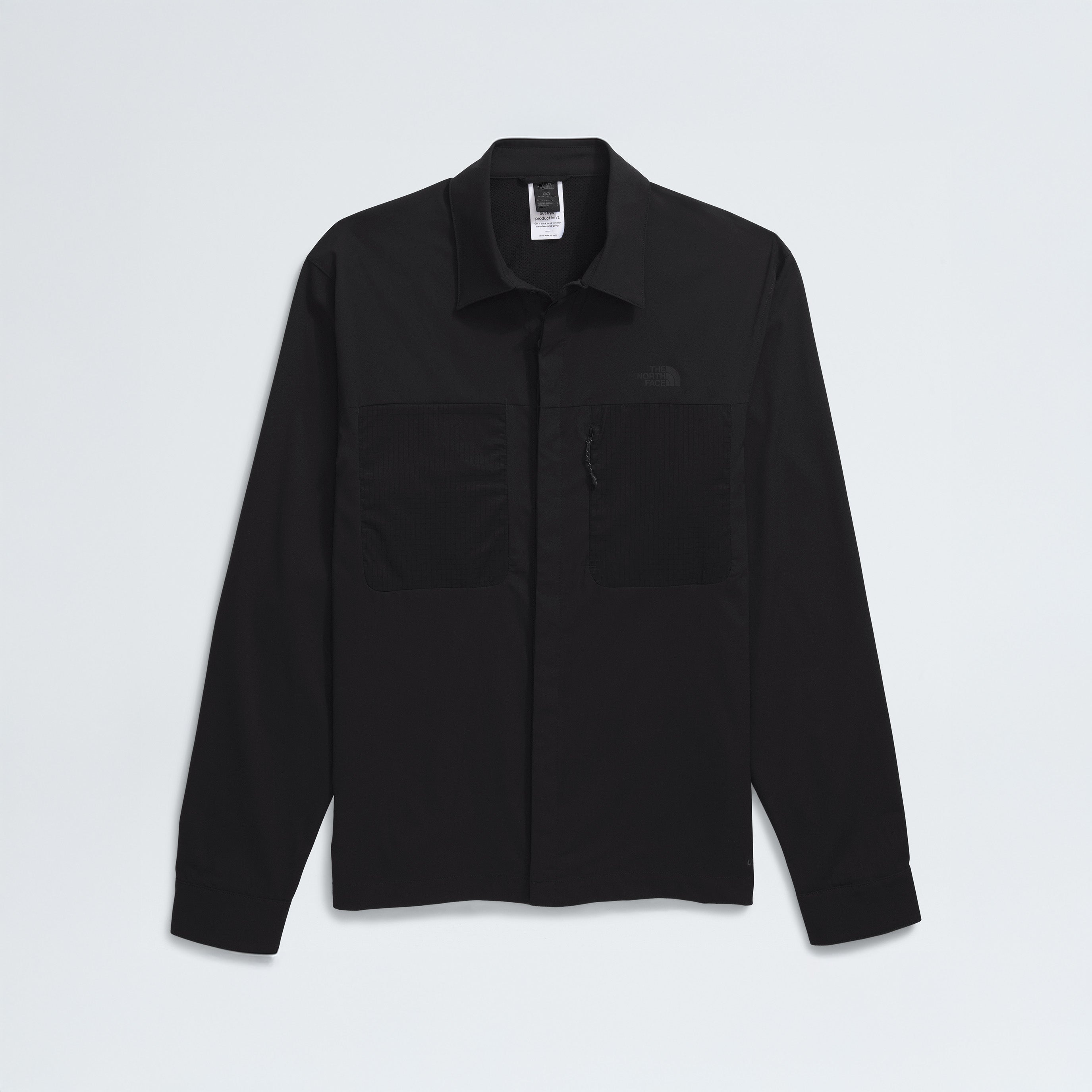 The North Face M L/S LIGHTRANGE Shirt in black, shown against a plain white background, features moisture-managing fabric and two chest pockets for on-trail comfort.