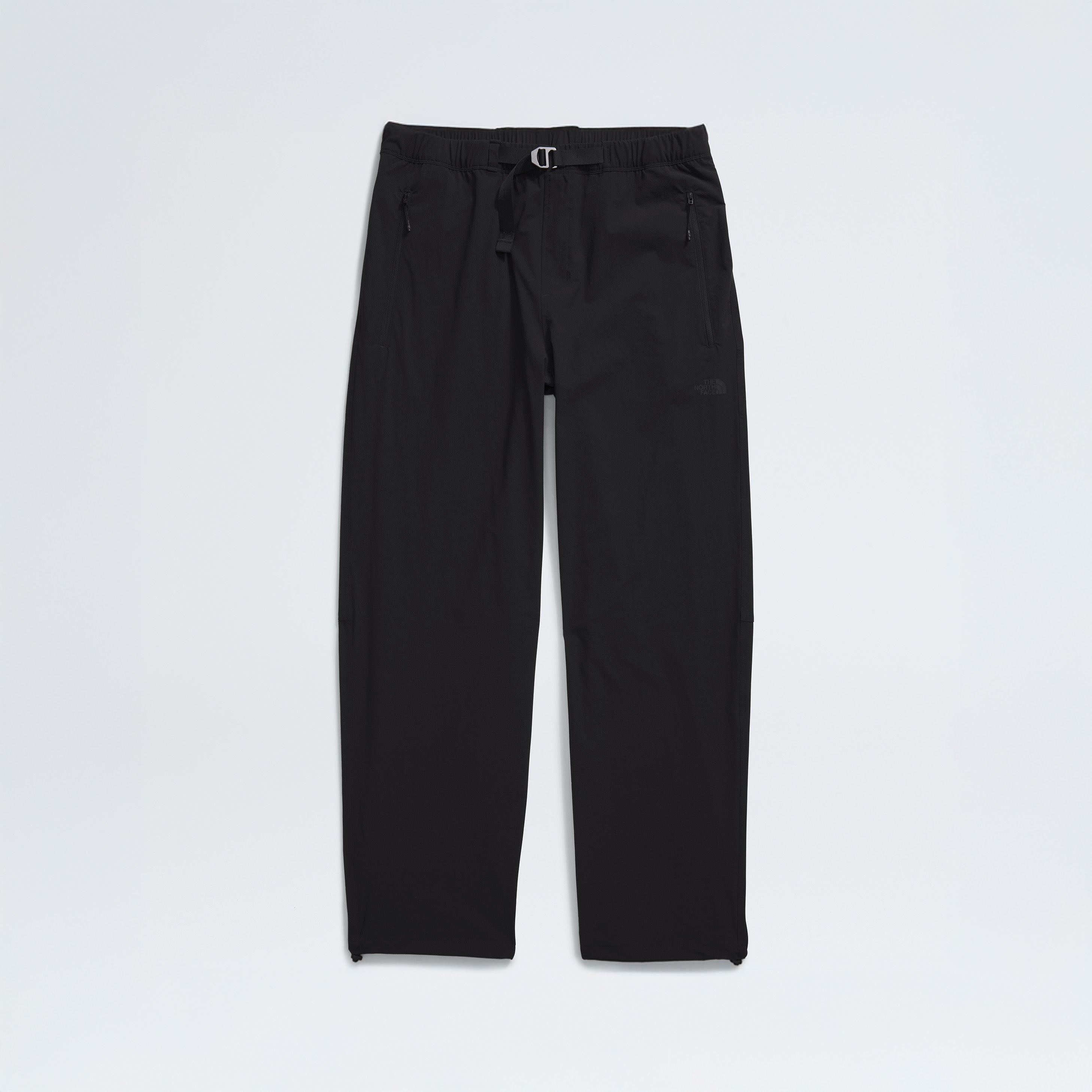 The North Face M North Dome Wind Pant in black features an adjustable waistband and zipper pockets, displayed on a plain white background.