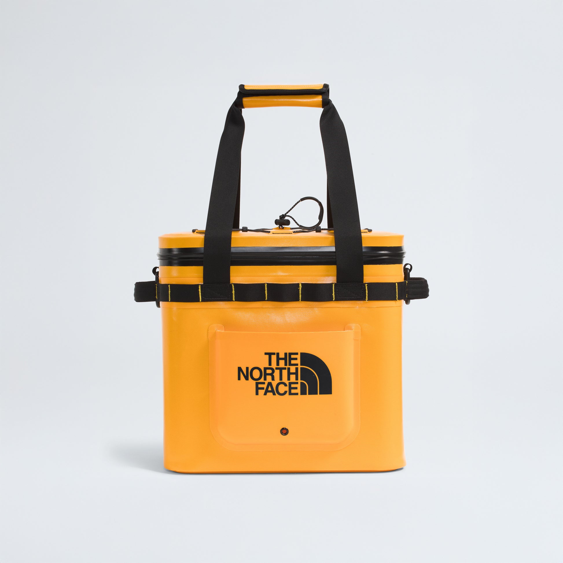 A yellow The North Face Base Camp Cooler 15 Qt with black handles, a front pocket, and the brand logo on the front, displayed on a plain white background.