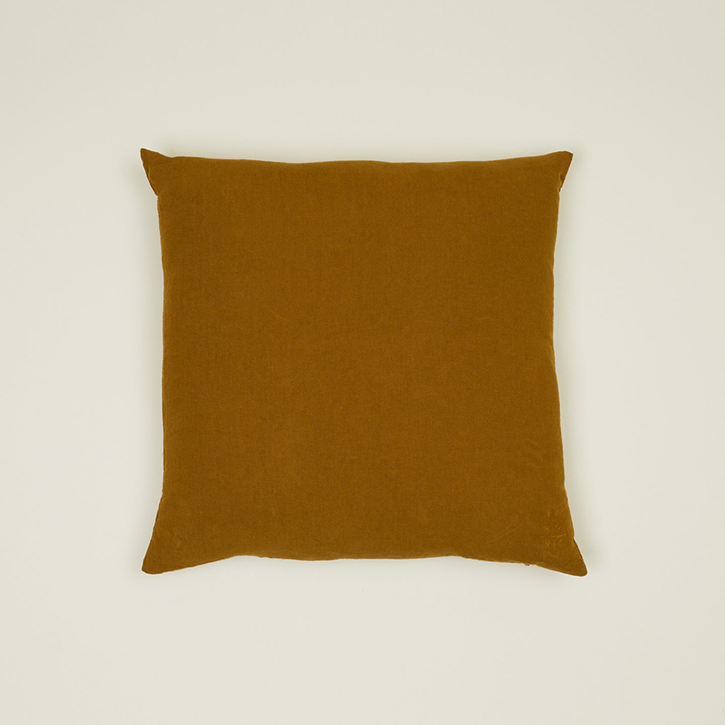 The Hawkins New York Simple Linen Pillow 22x22 in Bronze, made from European linen and Oeko-Tex Standard 100 certified, is shown on a plain light background.