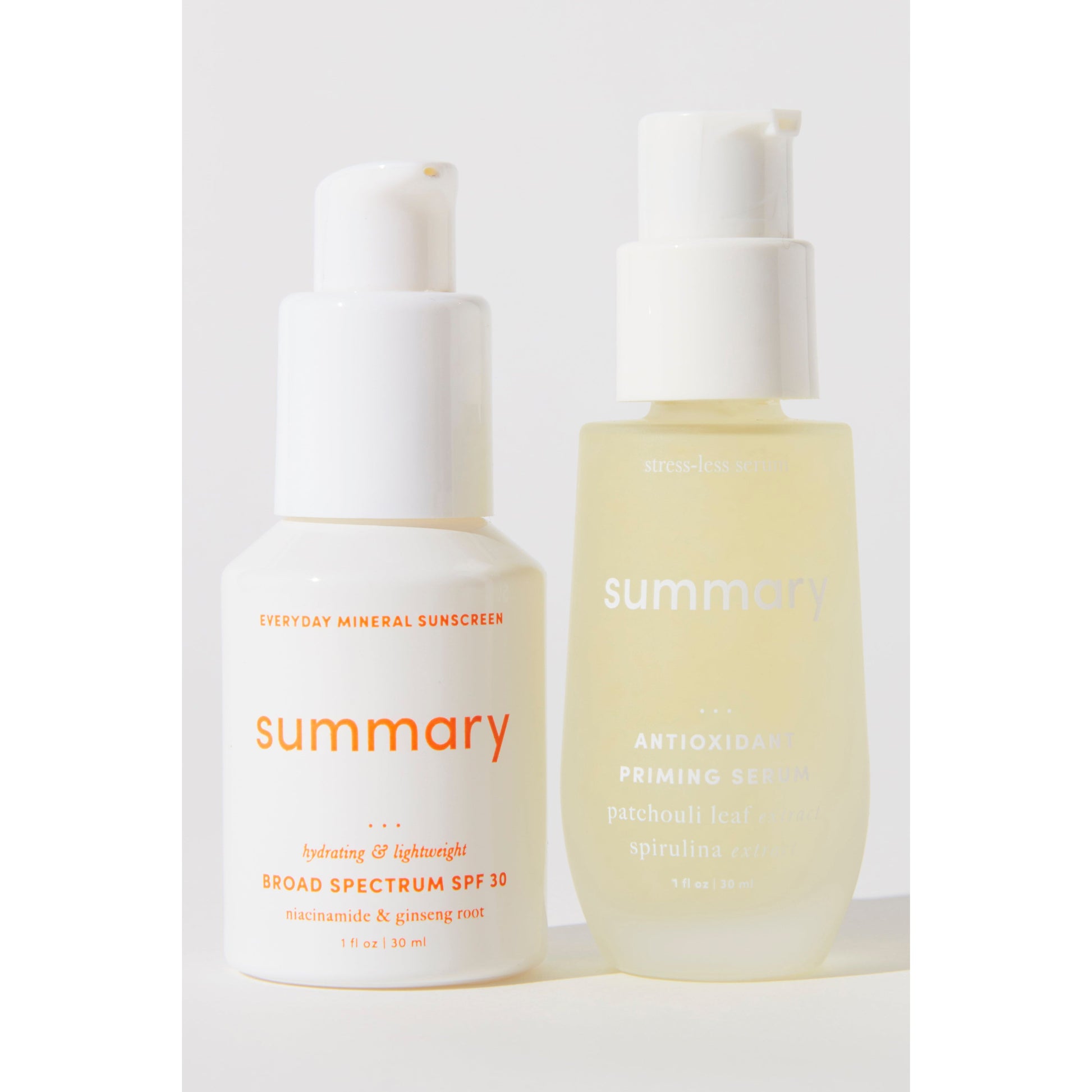Two skincare bottles labeled "Summary SPF 30," one a mineral-based sunscreen and the other an antioxidant serum, against a white background.