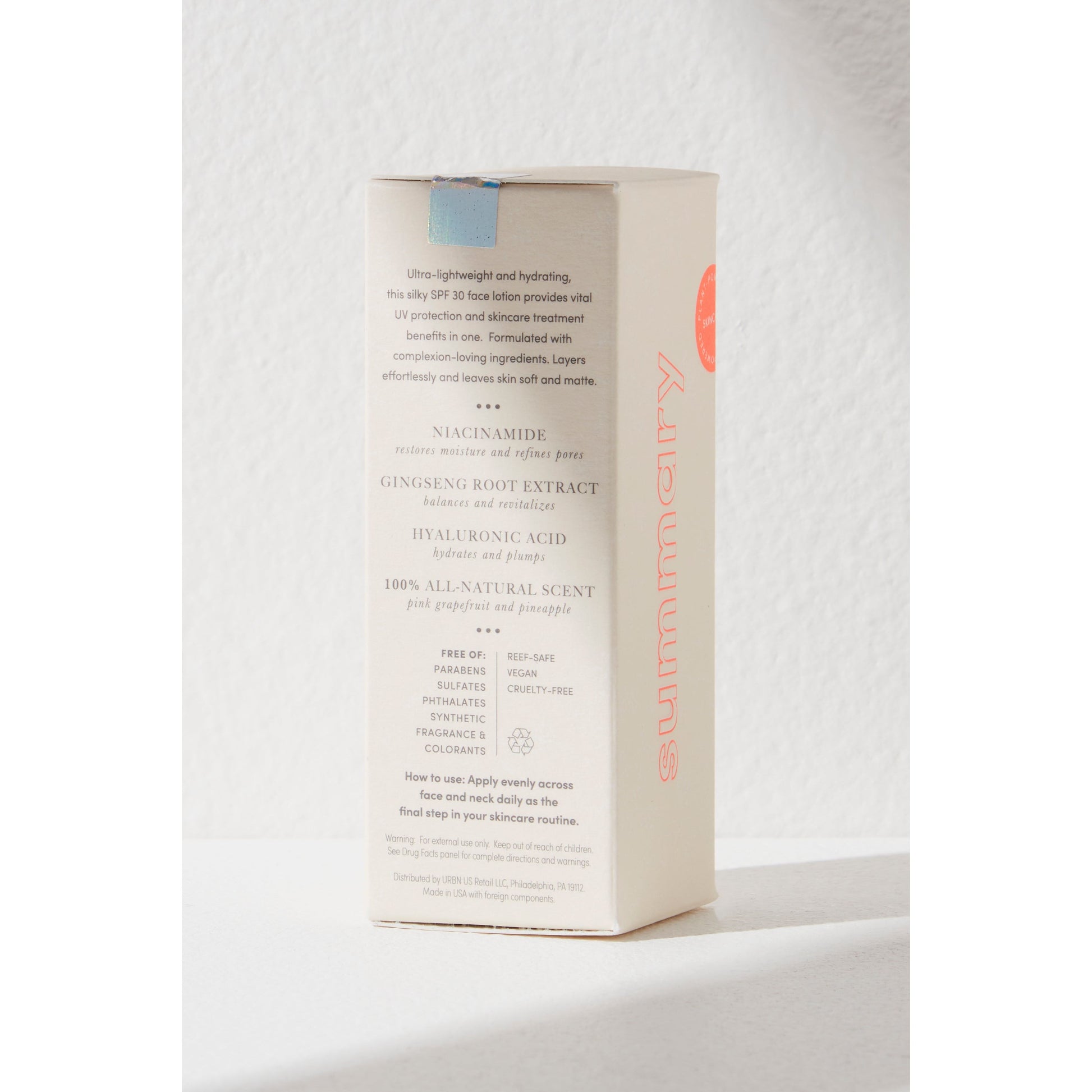 A box of Free People Movement Summary SPF 30 standing against a white textured background. The box lists ingredients and benefits like SPF 30 protection and hyaluronic acid.