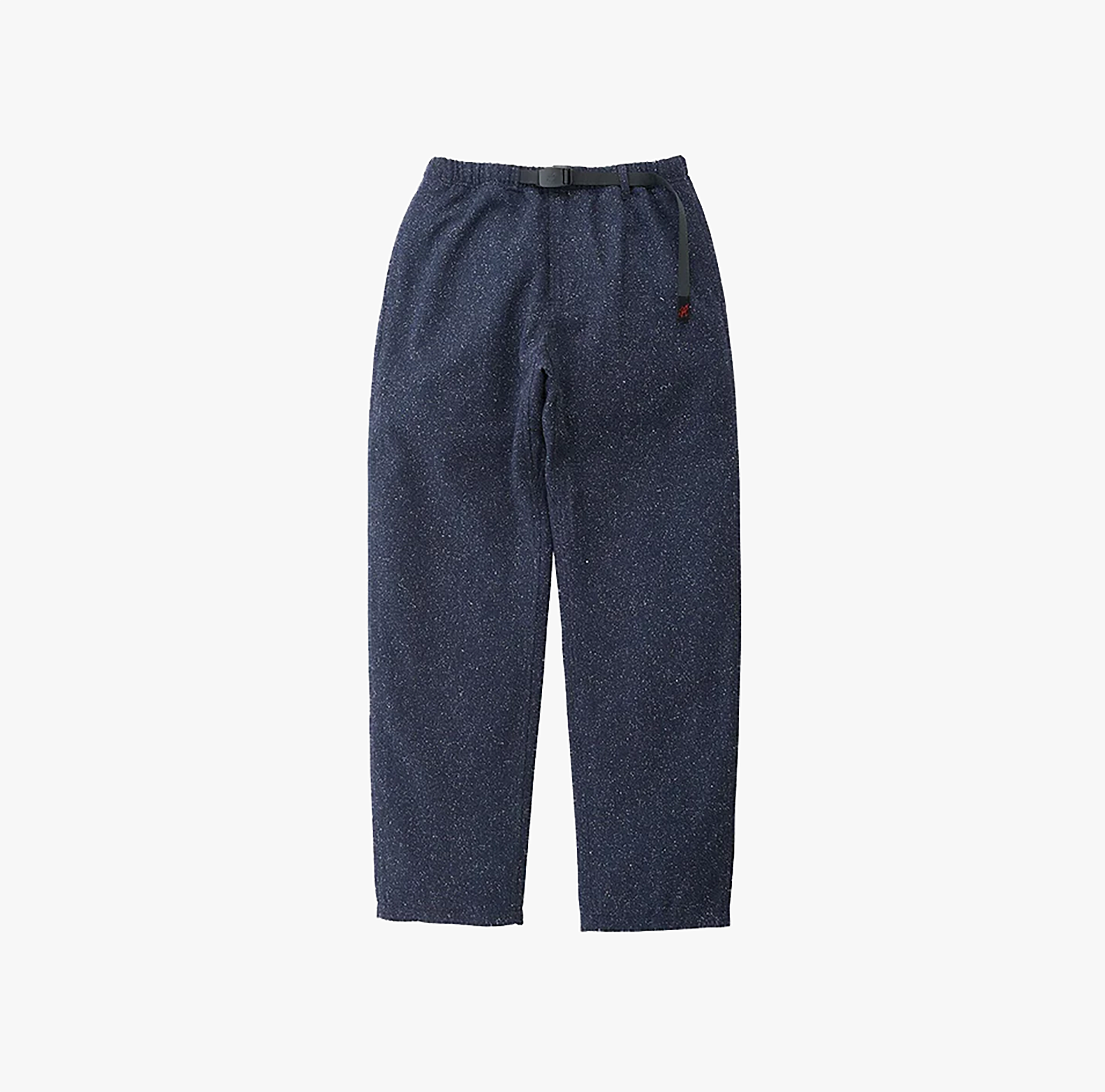 The Gramicci Wool Gramicci Pant in Navy features a relaxed fit with an elastic waistband and integrated belt. Crafted from a wool blend by Gramicci, it’s shown against a plain white background.