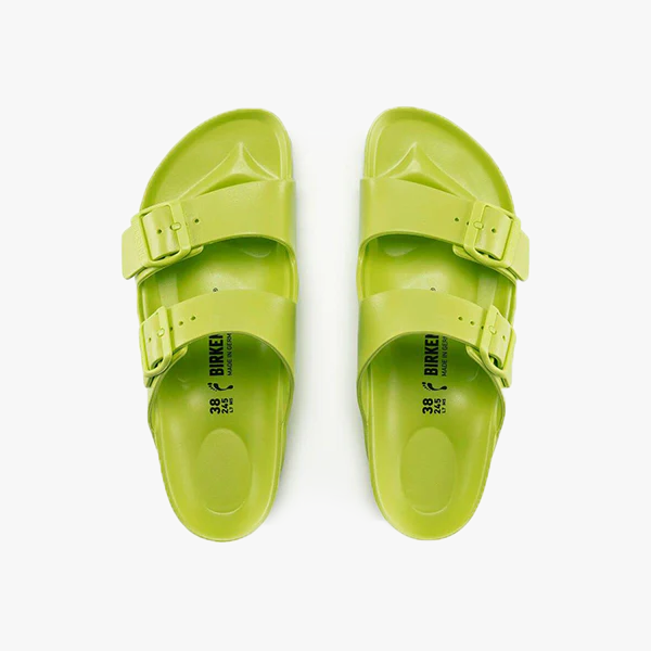 A pair of Birkenstock Arizona EVA Narrow sandals in Active Lime, featuring adjustable straps, is shown from above on a white background.