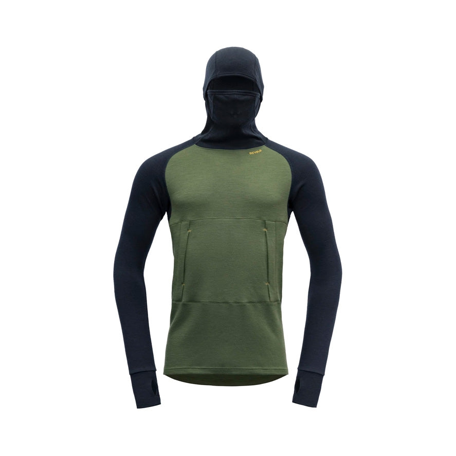 The Devold M Expedition Arctic Hoodie in Forest Ink, from our Expedition series, is a green and black Merino wool long-sleeve top featuring thumb holes, a face covering, and a kangaroo pocket. It's stylishly presented on a white background for ultimate comfort and convenience.