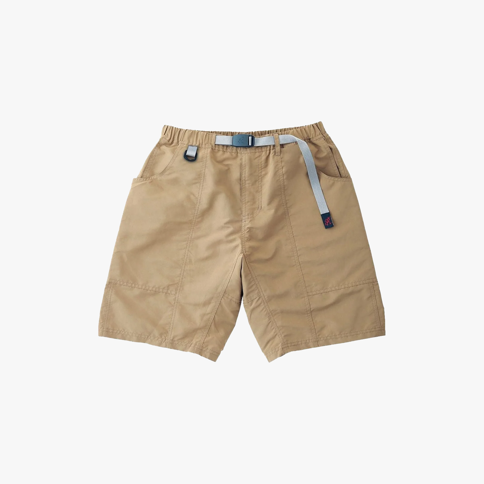 The Gramicci Shell Gear Short in beige features an elastic waistband, integrated light gray belt, side pockets, and visible stitching, shown on a white background.