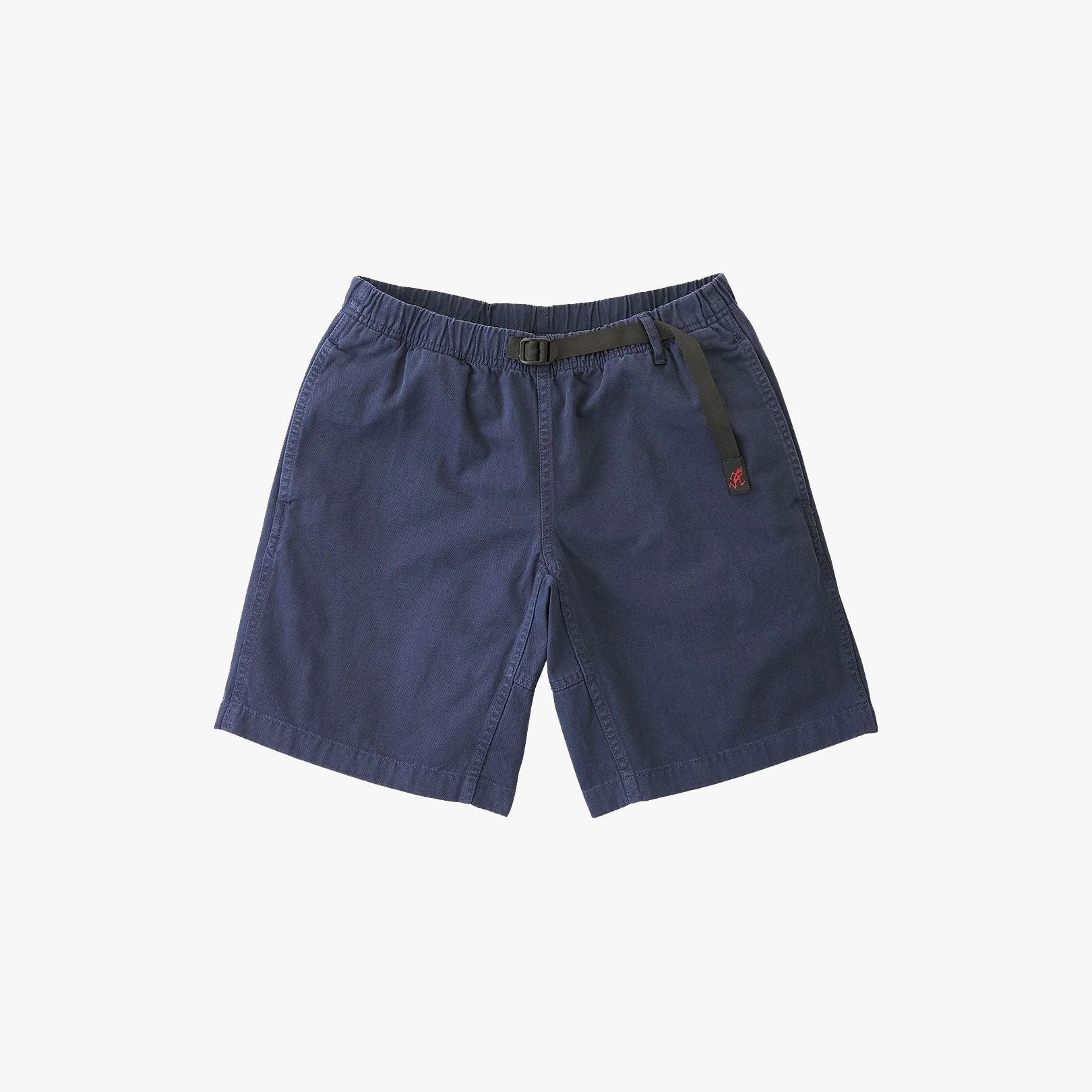 The Gramicci G-Short in navy blue features a flex fit elastic waistband, adjustable belt, and side pockets, displayed on a white background.