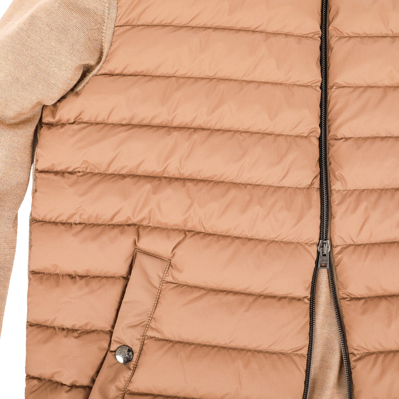 Close-up of the Herno Men's Zip Front Cardigan in Camel, featuring a silky-soft finish, zip closure, snap-button pocket, and worn over a beige long-sleeve sweater.