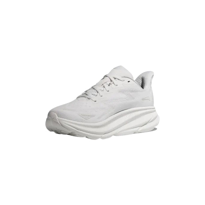The Hoka M Clifton 9 in White/White is an athletic sneaker featuring a thick, textured sole, shown from a side angle on a plain white background.