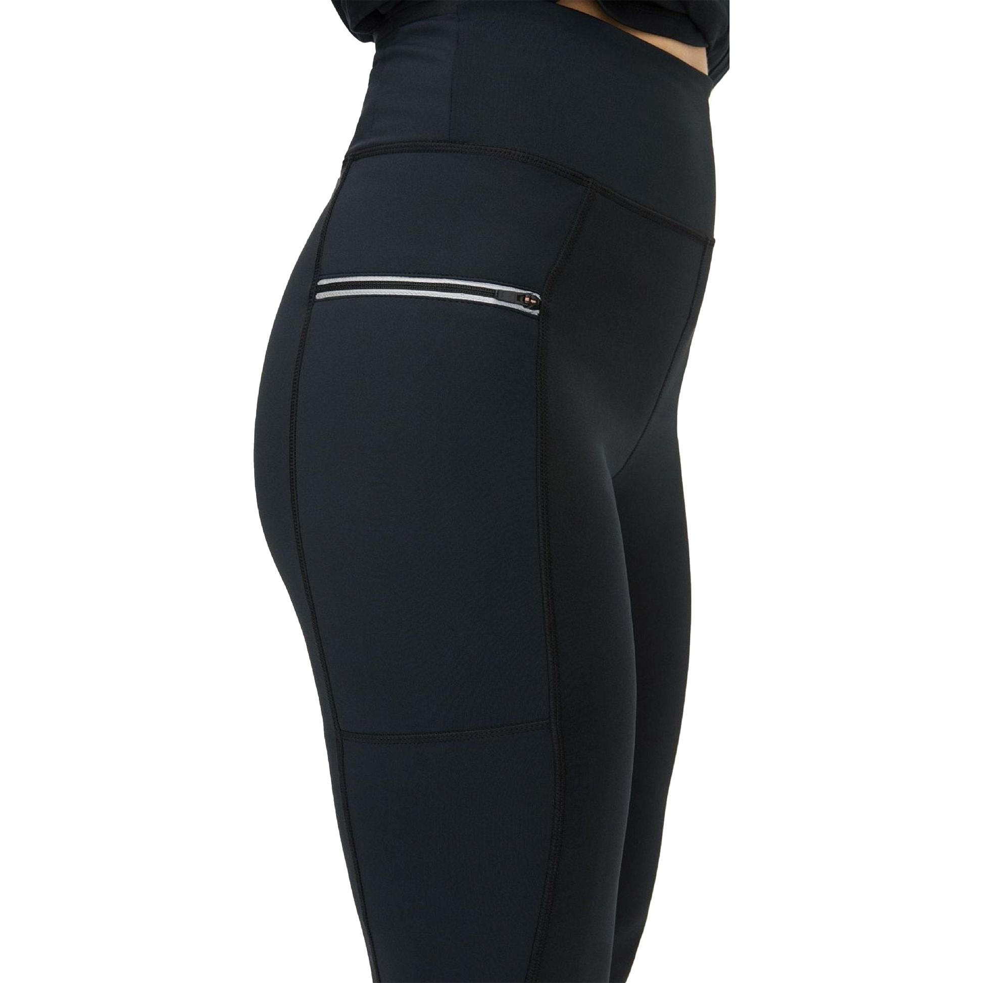 A person in Rohnisch Insulate Wind Shield Tights featuring black high-waisted design, a side zipped pocket, and an elastic drawstring for a snug fit.