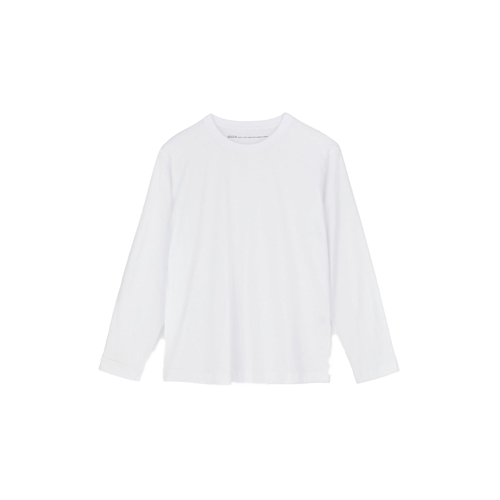 The LS Cotton Tee by Aiayu is an oversized long-sleeve shirt made from organic cotton, serving as a wardrobe essential. Its timeless white design elegantly stands out against a stark black background.