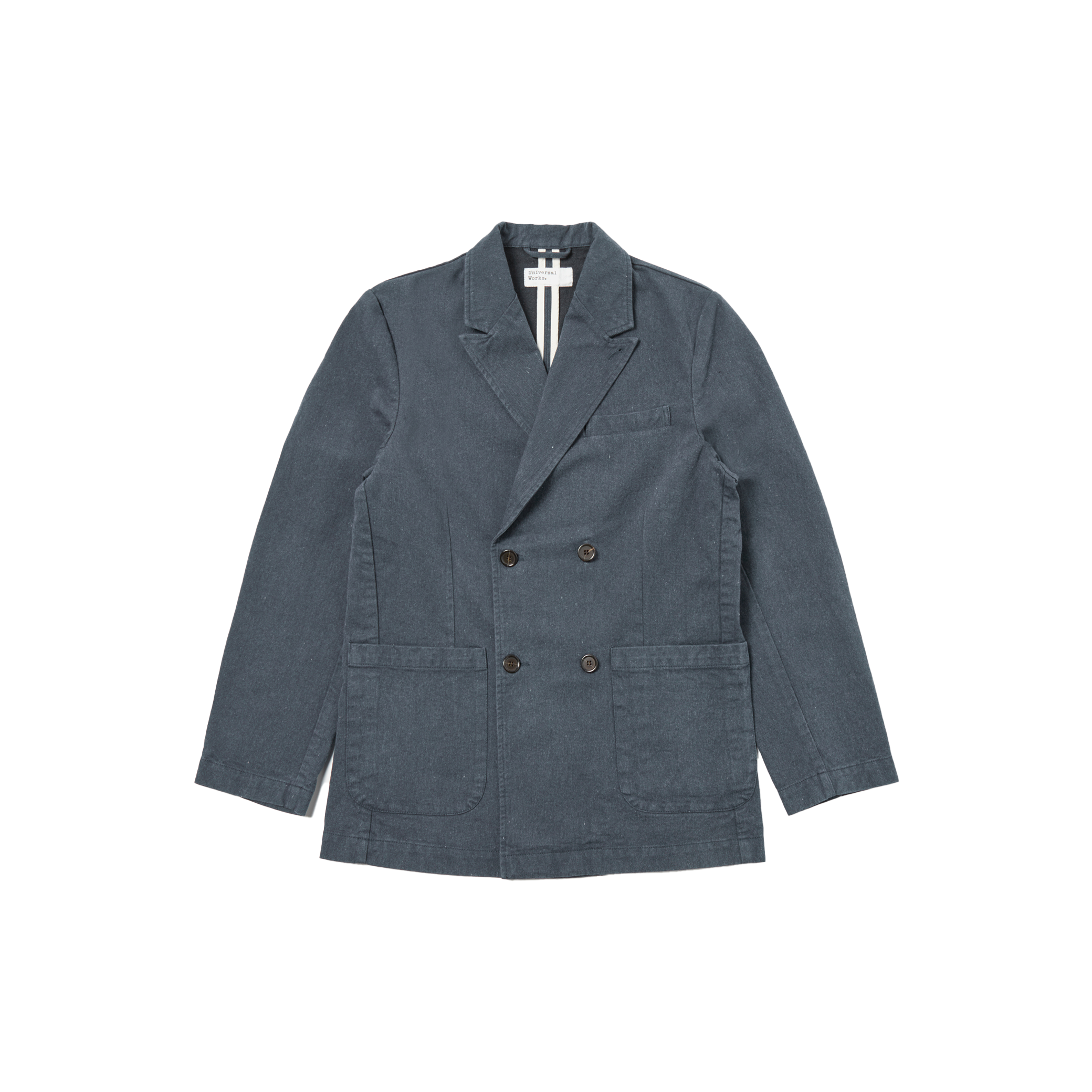 The Manor Jacket by Universal Works, a dark gray men's double-breasted blazer made from recycled cotton, featuring large pockets and a notched lapel, lies flat against a plain background.
