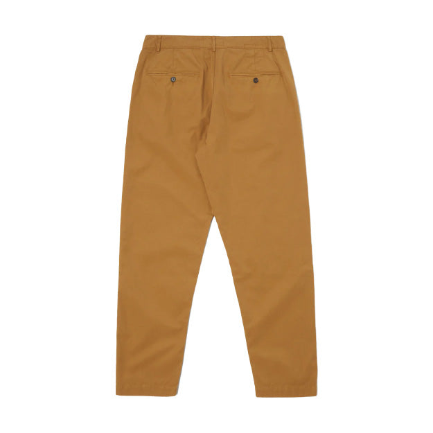These stylish Military Chino trousers in cumin from Universal Works boast two back pockets and a button closure, elegantly showcased on a white background. A contemporary classic for any wardrobe.