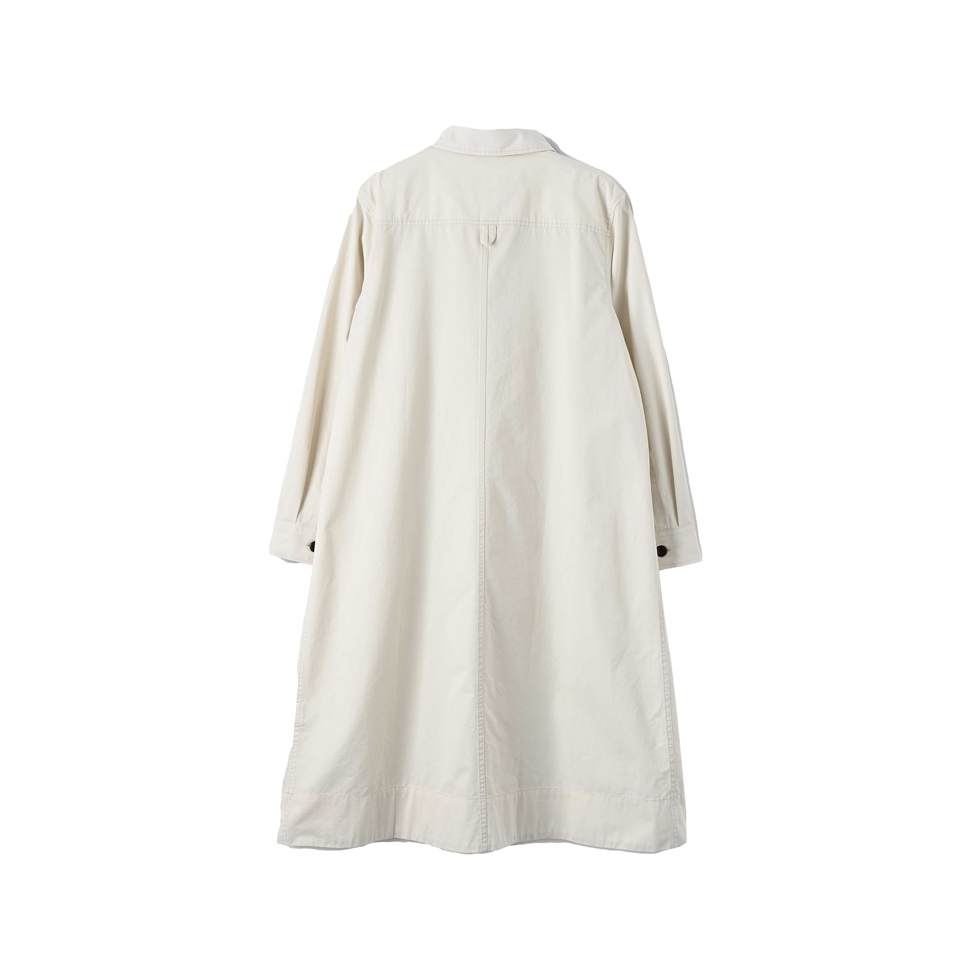 Back view of the Margaret Howell Swing Dress, an oversized cut trench coat in white, featuring patch pockets, a collar, and buttoned cuffs, hanging against a plain background.