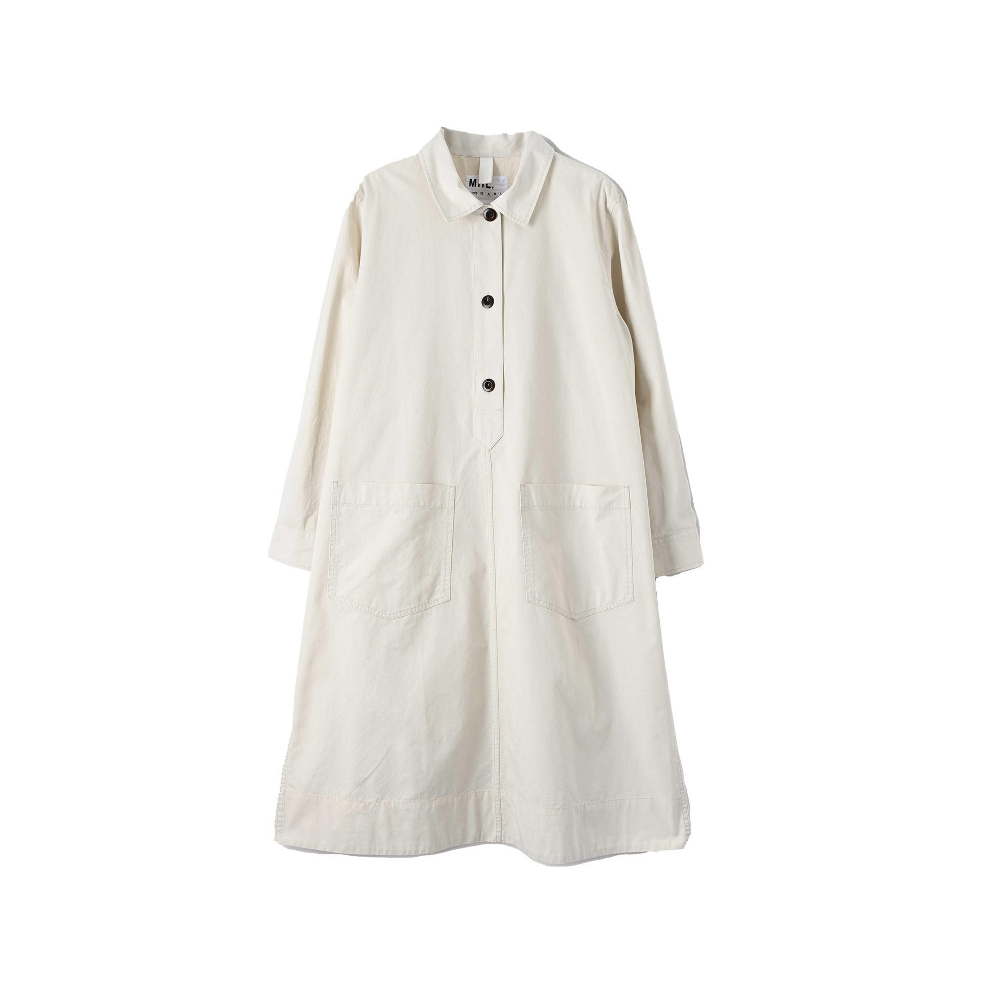 A Margaret Howell cream-colored Swing Dress with long sleeves, featuring an oversized cut and large front patch pockets, laid flat on a white background.