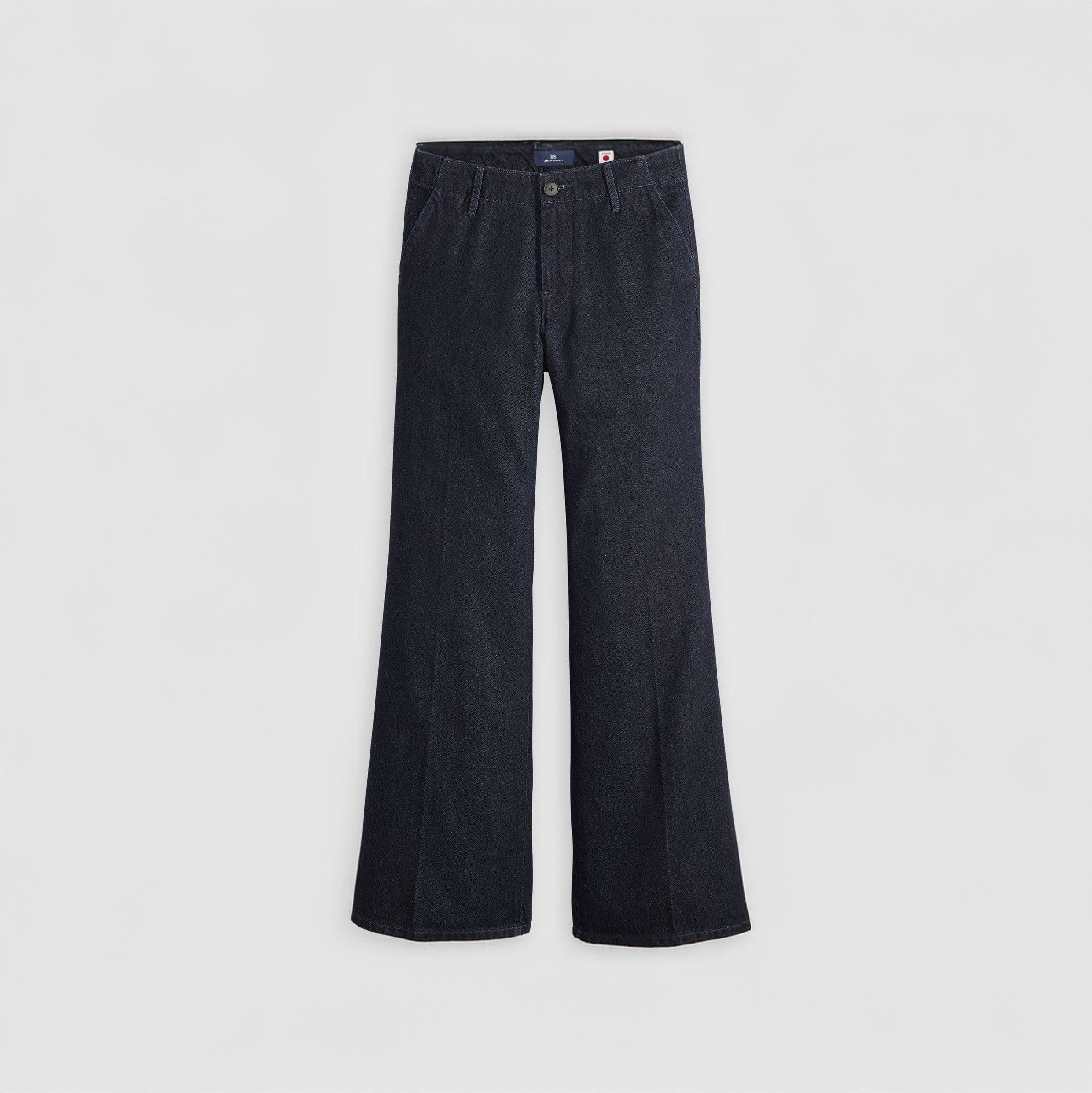 The Levis Stem Flare Trouser features dark blue denim with a high waist and wide-leg cut, shown against a plain white background.