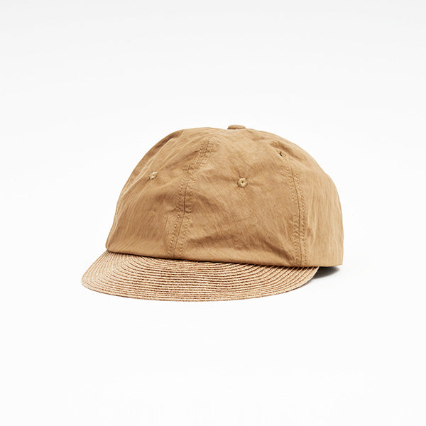 The Sublime Roe Charidoor Cap is a plain, light brown baseball cap with a slightly wrinkled texture, shown against a white background.