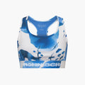 The Emblem Racerback Sportsbra by Rohnisch is a blue and white high support bra with abstract patterns, displaying the brand on the front band. Its moisture-wicking fabric keeps you comfortable and fresh during intense workouts.
