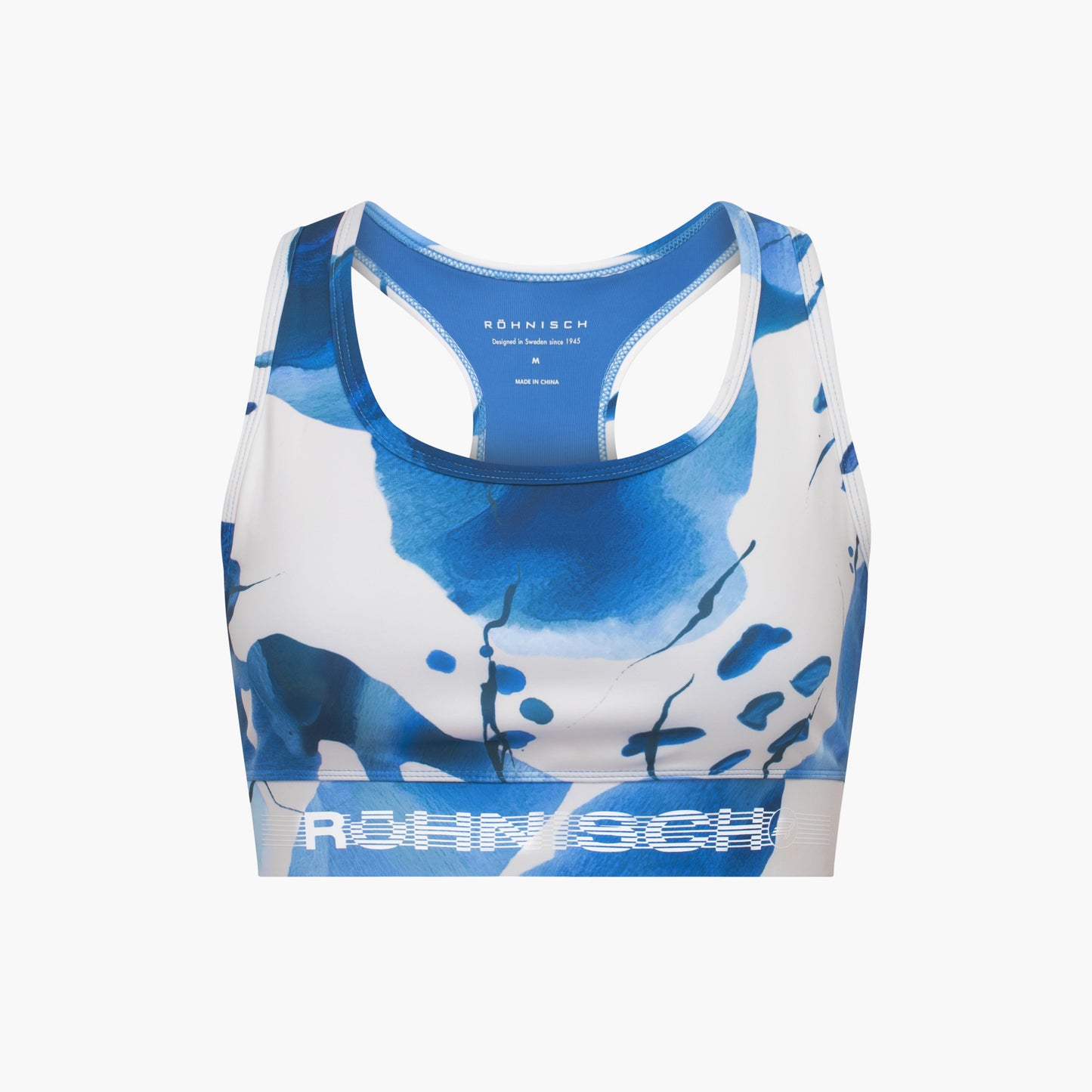 The Emblem Racerback Sportsbra by Rohnisch is a blue and white high support bra with abstract patterns, displaying the brand on the front band. Its moisture-wicking fabric keeps you comfortable and fresh during intense workouts.