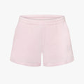 Rohnisch's Soft Sweatshorts in light pink are crafted from soft Terry fabric and feature an elastic waistband with a subtle logo print on a plain white background.