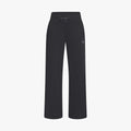 Soft Sweat Wide Pants by Rohnisch, made from recycled fabric, feature a drawstring waist and small embroidered emblem on the left thigh. Displayed against a plain white background.