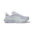 The W Bondi 8 sneaker by Hoka, in Ether/Illusion, features a thick cushioned sole for a balanced ride and a breathable mesh upper showcasing the signature "HOKA" branding.
