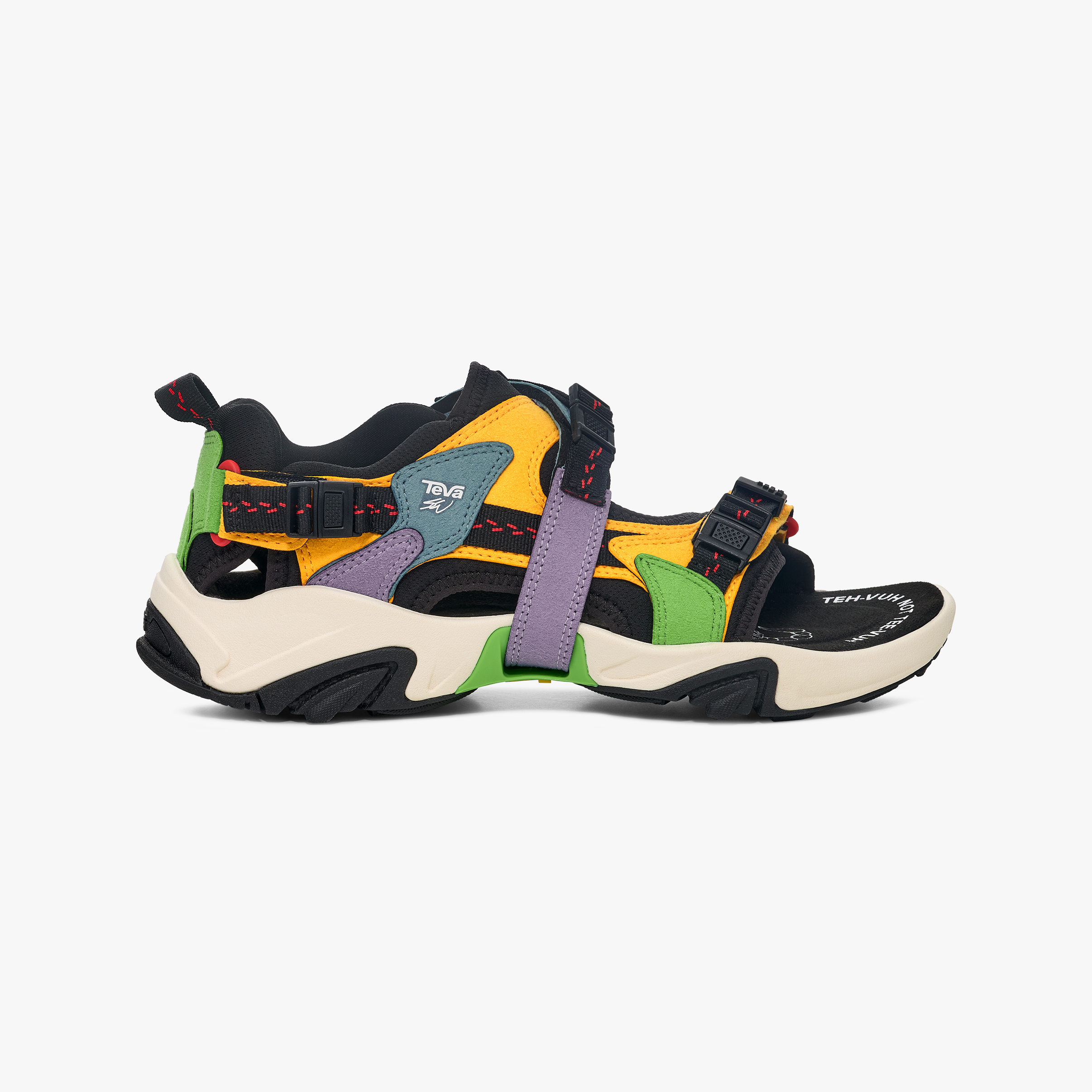 The Teva U SW X WRAPTOR Sandal features orange, yellow, green, purple, and black panels with a 360-degree strapping system, black adjustable straps, and a chunky cream and black sole.