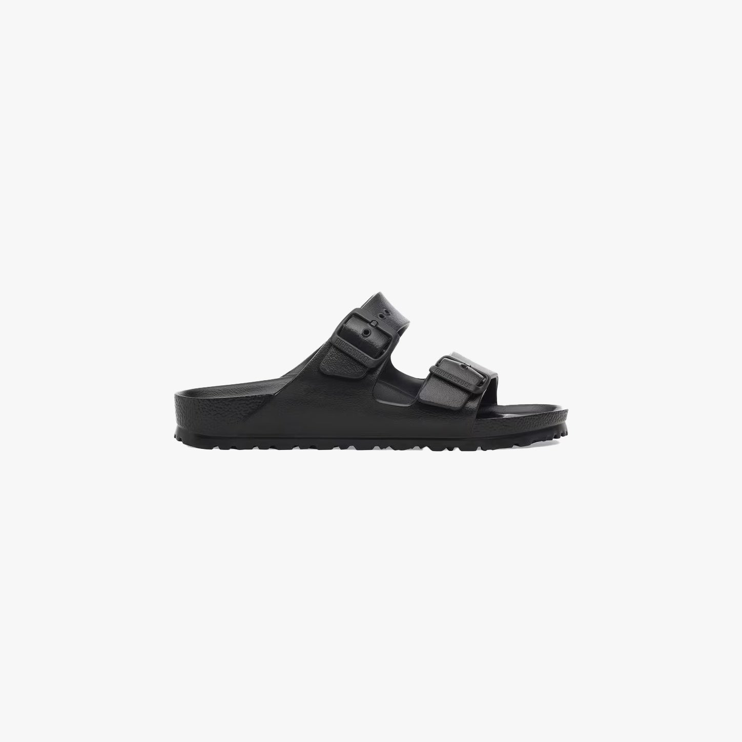 The Birkenstock Arizona EVA Narrow in black features two adjustable buckles, a contoured footbed, and a water-friendly design. Shown in side profile on a white background.