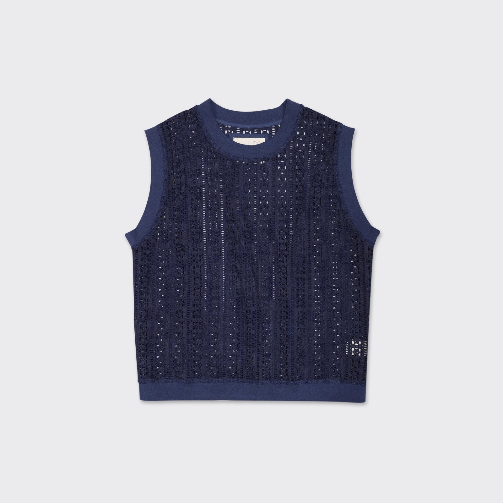 The Kardo Noto Vest in Future Dusk is a sleeveless navy crochet knit top with ribbed collar, armholes, and hem, shown against a plain light background.