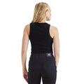 A woman with blonde hair is facing away, wearing a Dockers Women's Rib Tank with Loft Knit in black and dark jeans.
