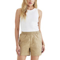 A person wearing a Dockers Women's Rib Tank with Loft Knit and tan shorts stands with hands at sides against a plain background.