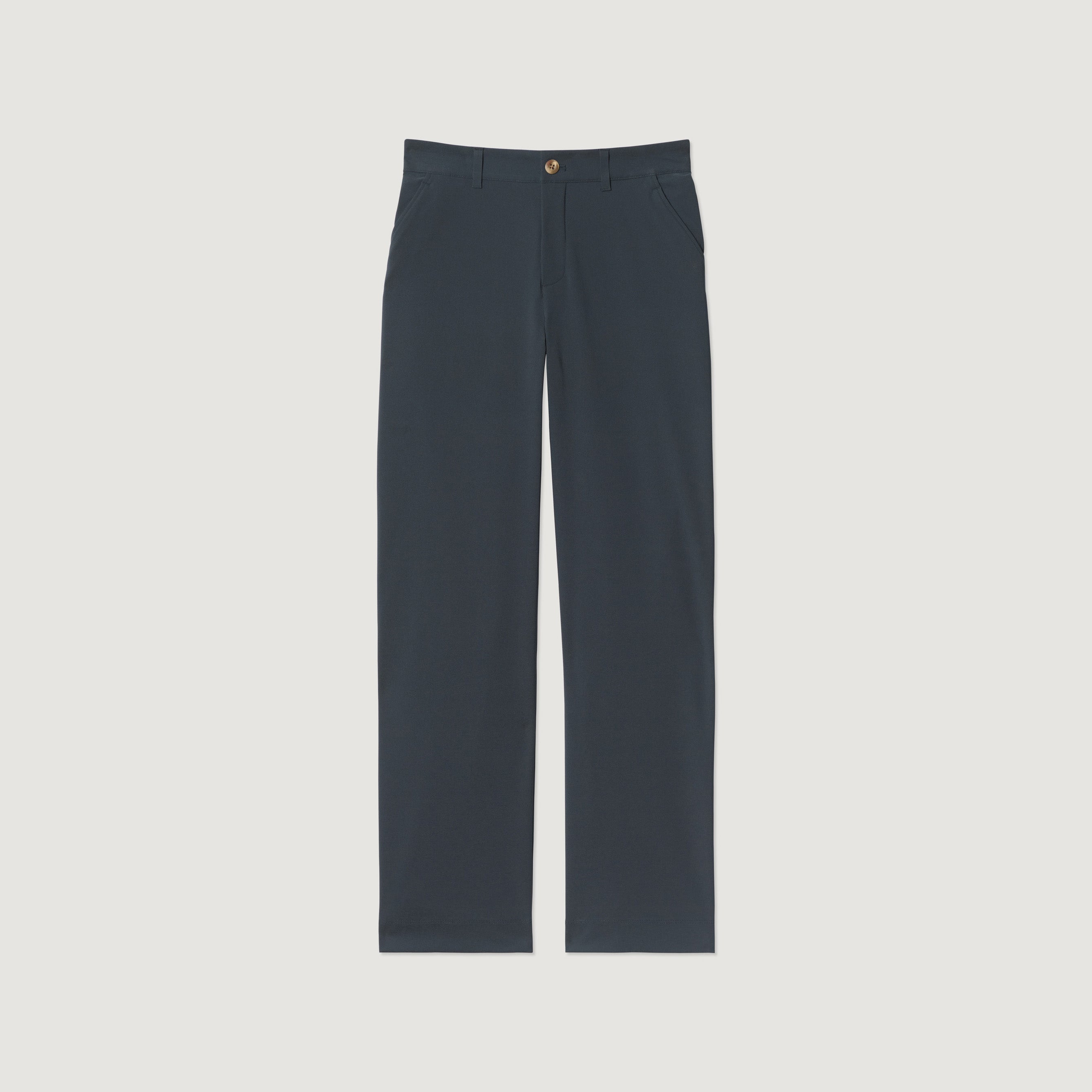 The Hikerkind Trail Trousers 02 are women’s dark blue straight-leg hiking pants with side pockets, a front zipper, and button closure, designed for comfort and shown laid flat on a white background.