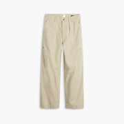 The Dockers D-Series Utility Pant in beige from the Transnomadica Collection features front and side pockets with button and zip closure, displayed on a white background.